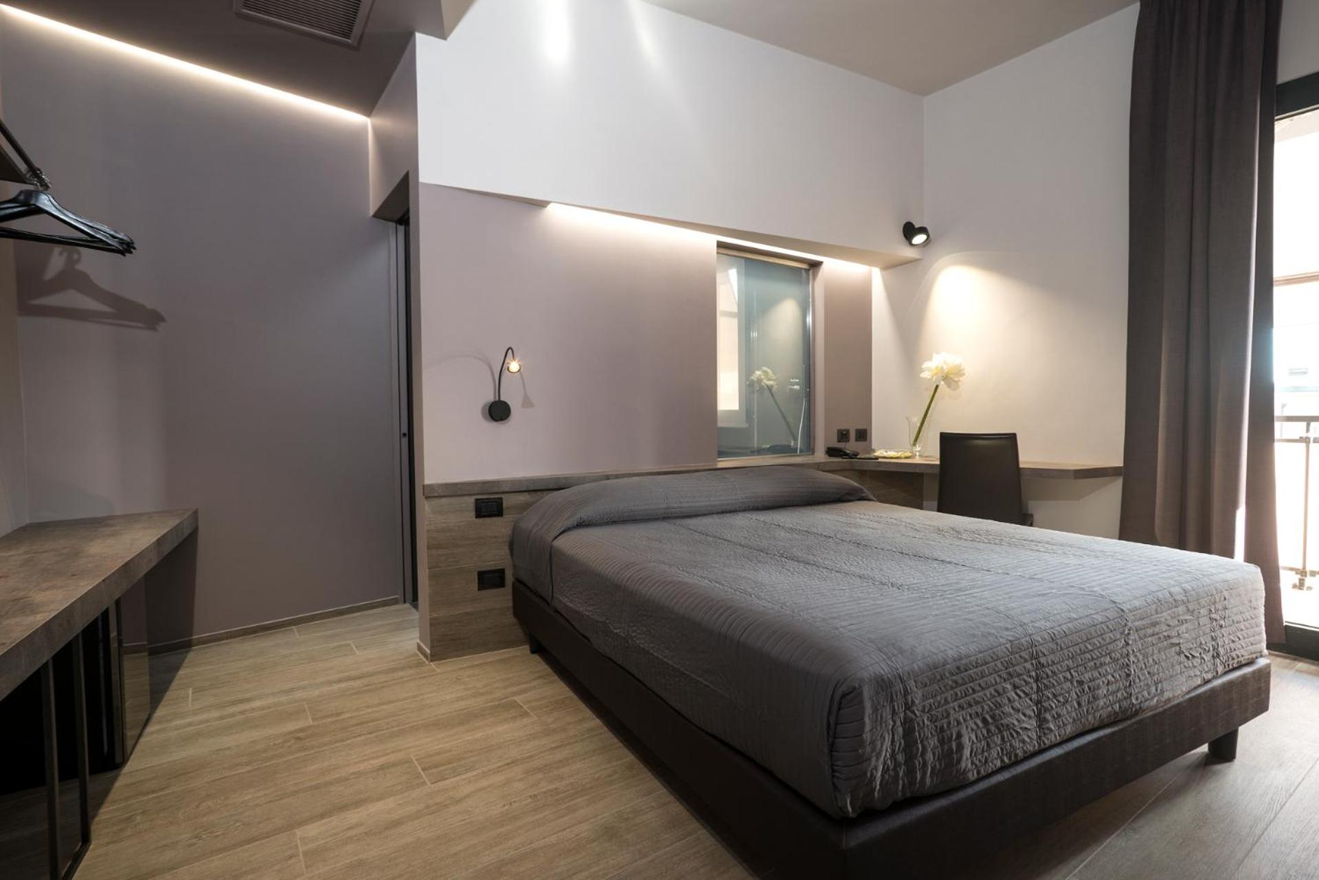 Deluxe Quadruple Room - Photo 4