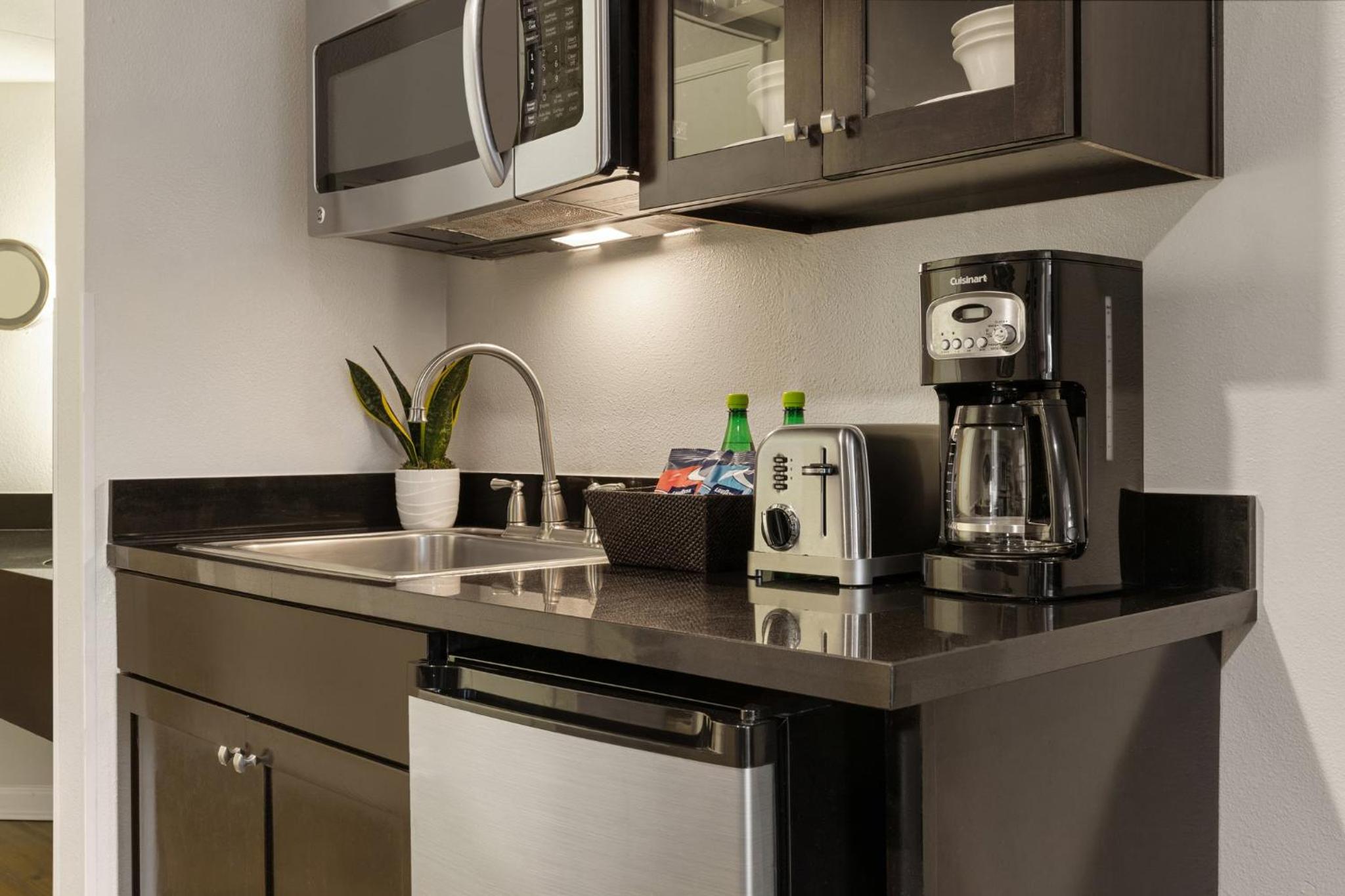 Peacock Suites kitchen in King Suite with Sofa Bed