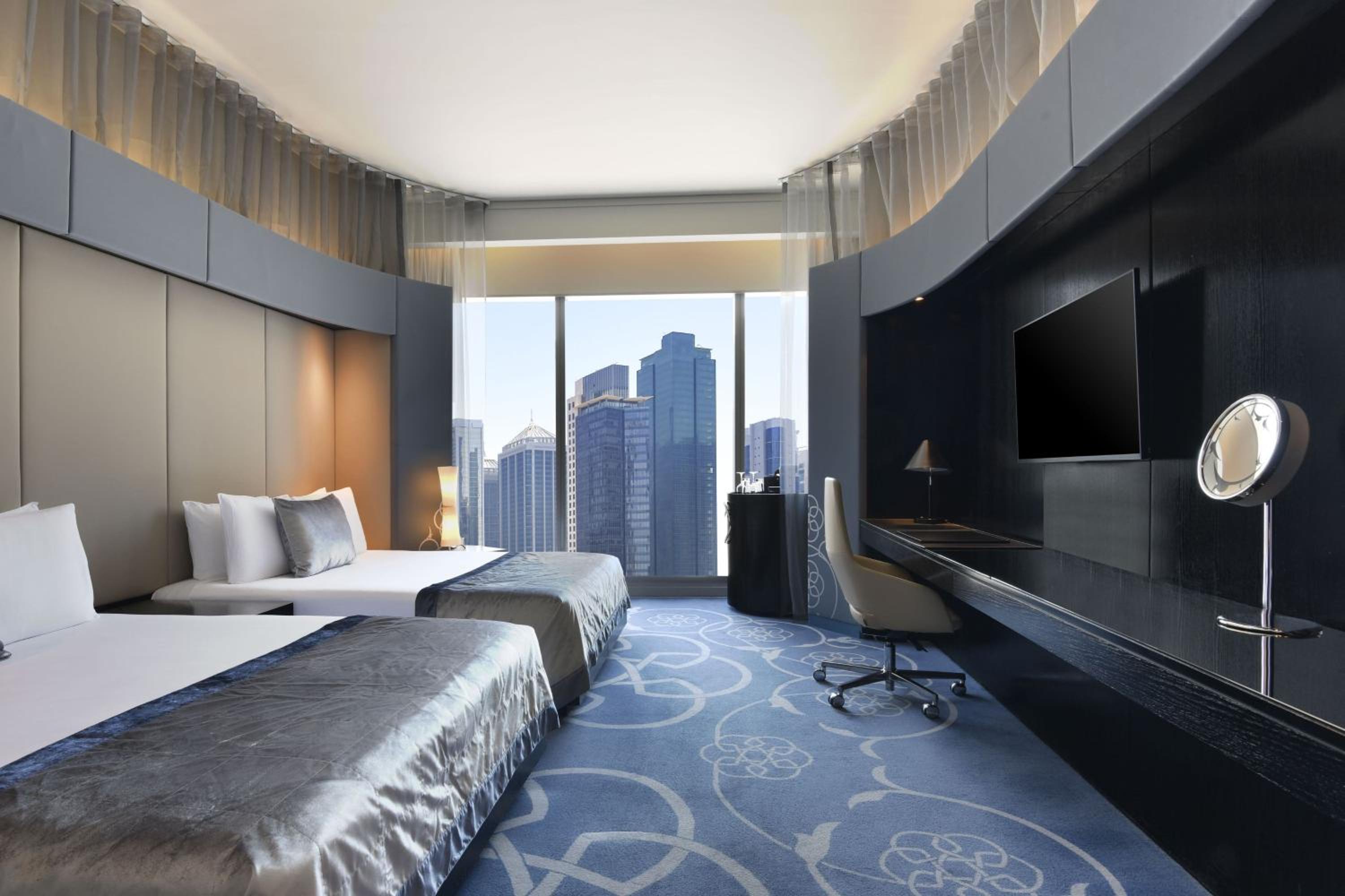 Deluxe Room with Two Double Beds and City View - Photo 1