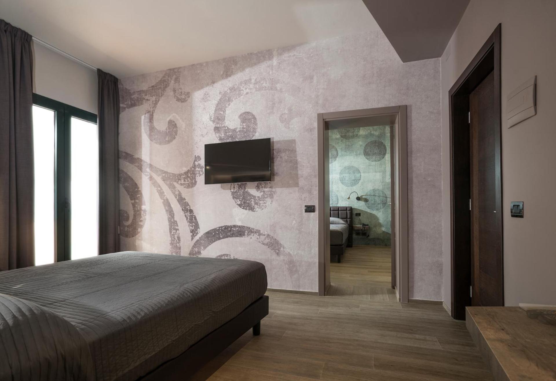 Deluxe Quadruple Room - Photo 1