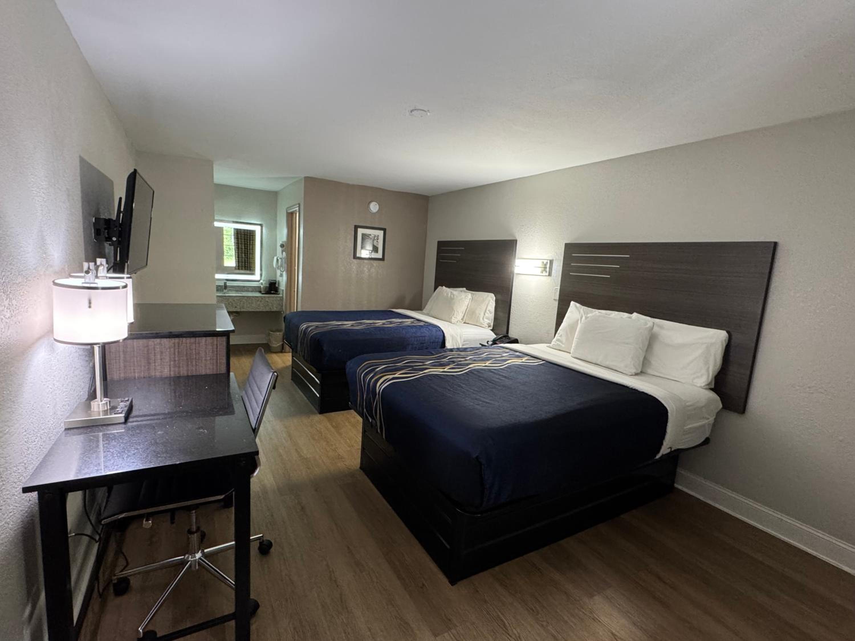Queen Room with Two Queen Beds - Photo 1