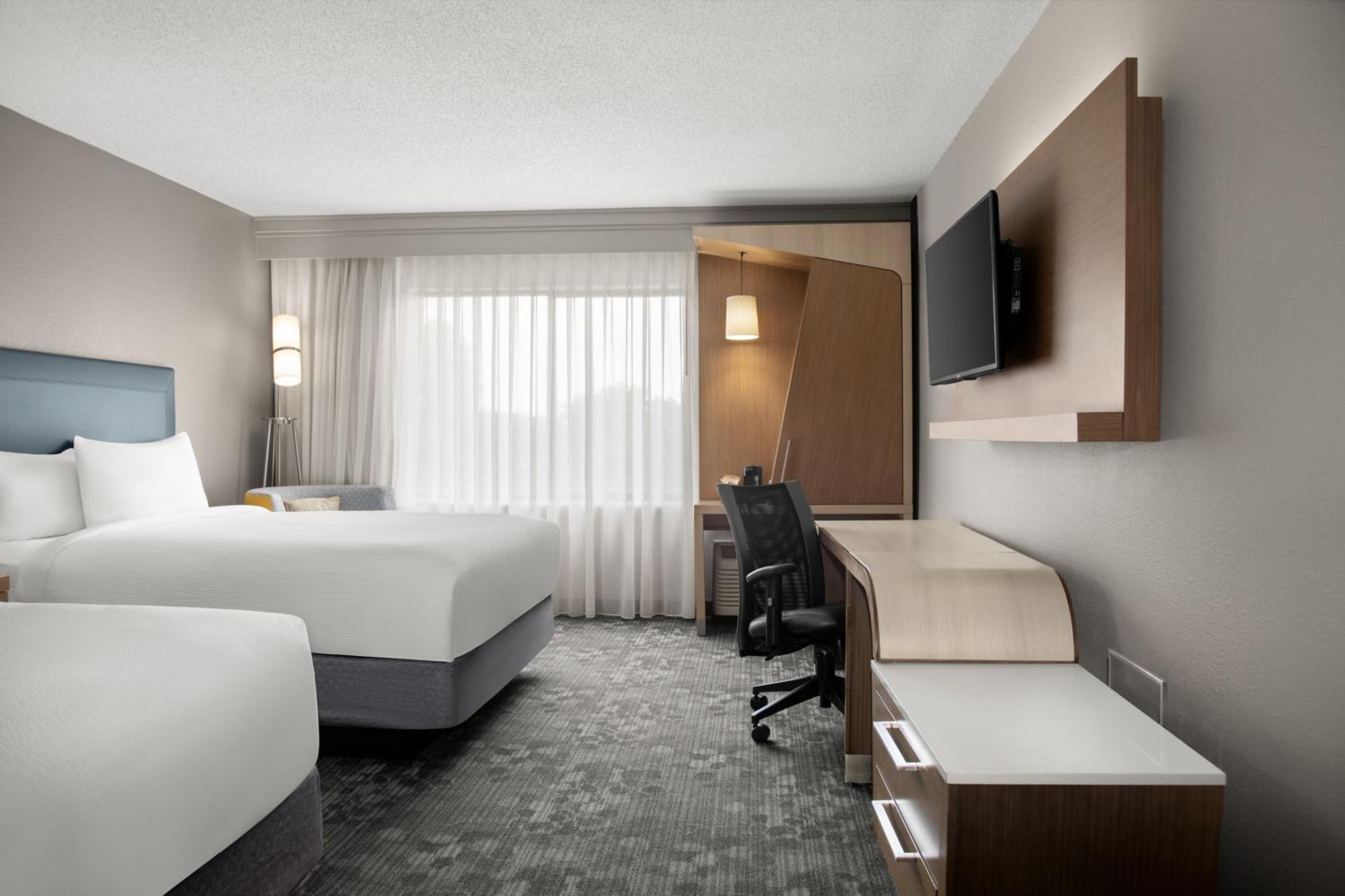 Queen Room with Two Queen Beds - Photo 1