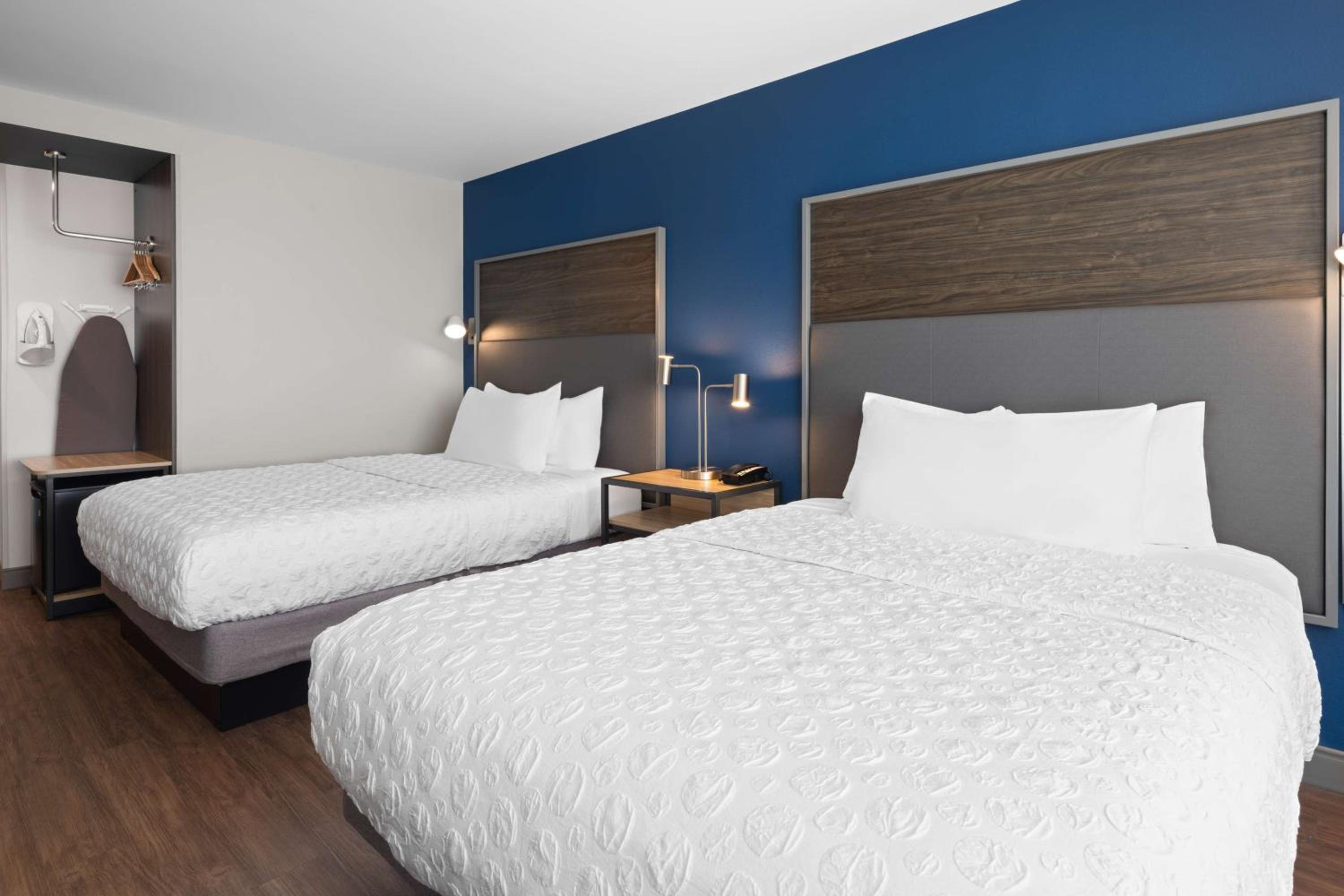 Queen Room with Two Queen Beds and Walk-In Shower - Photo 1