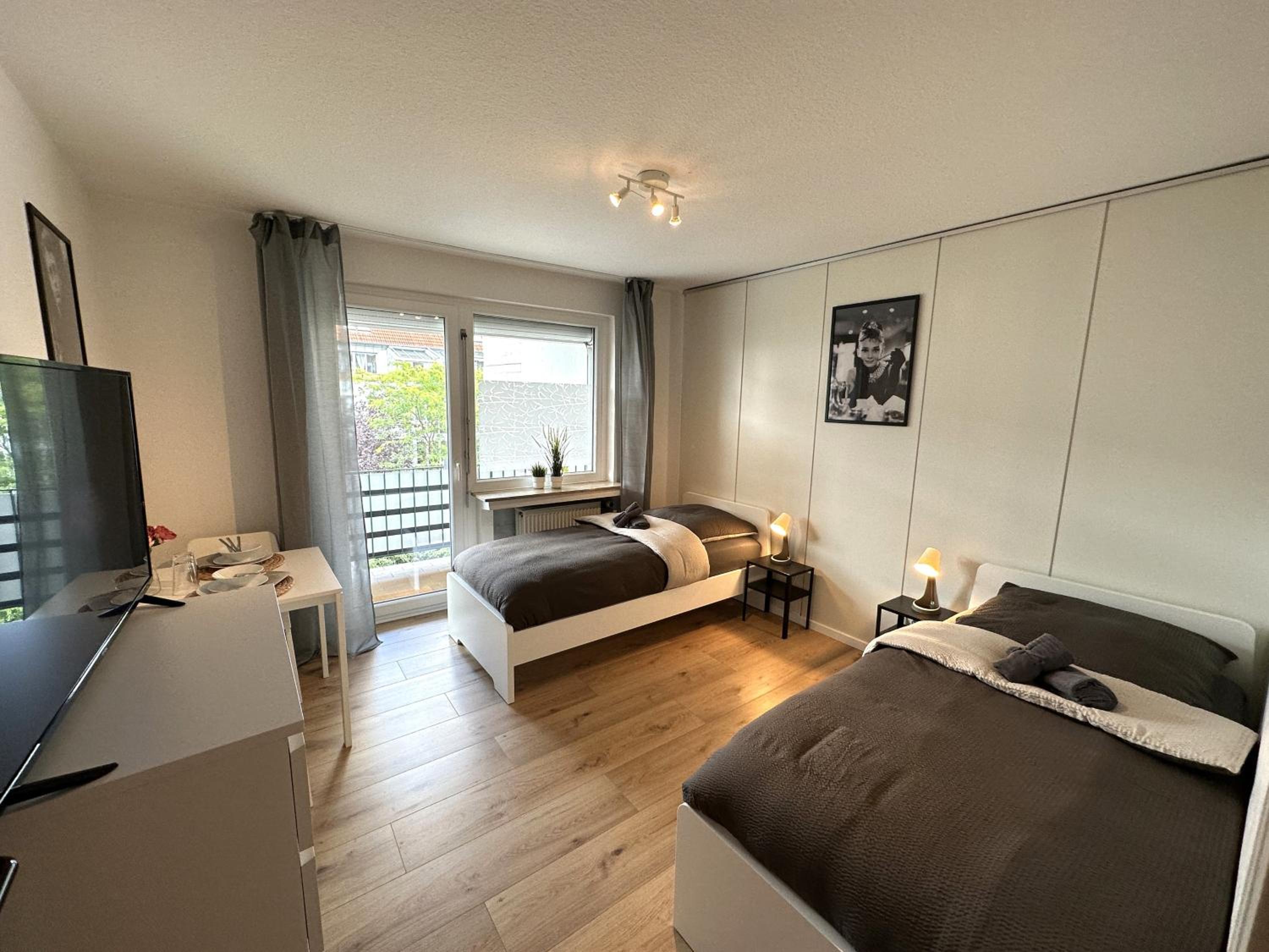 Three-Bedroom Apartment with Balcony photo 1