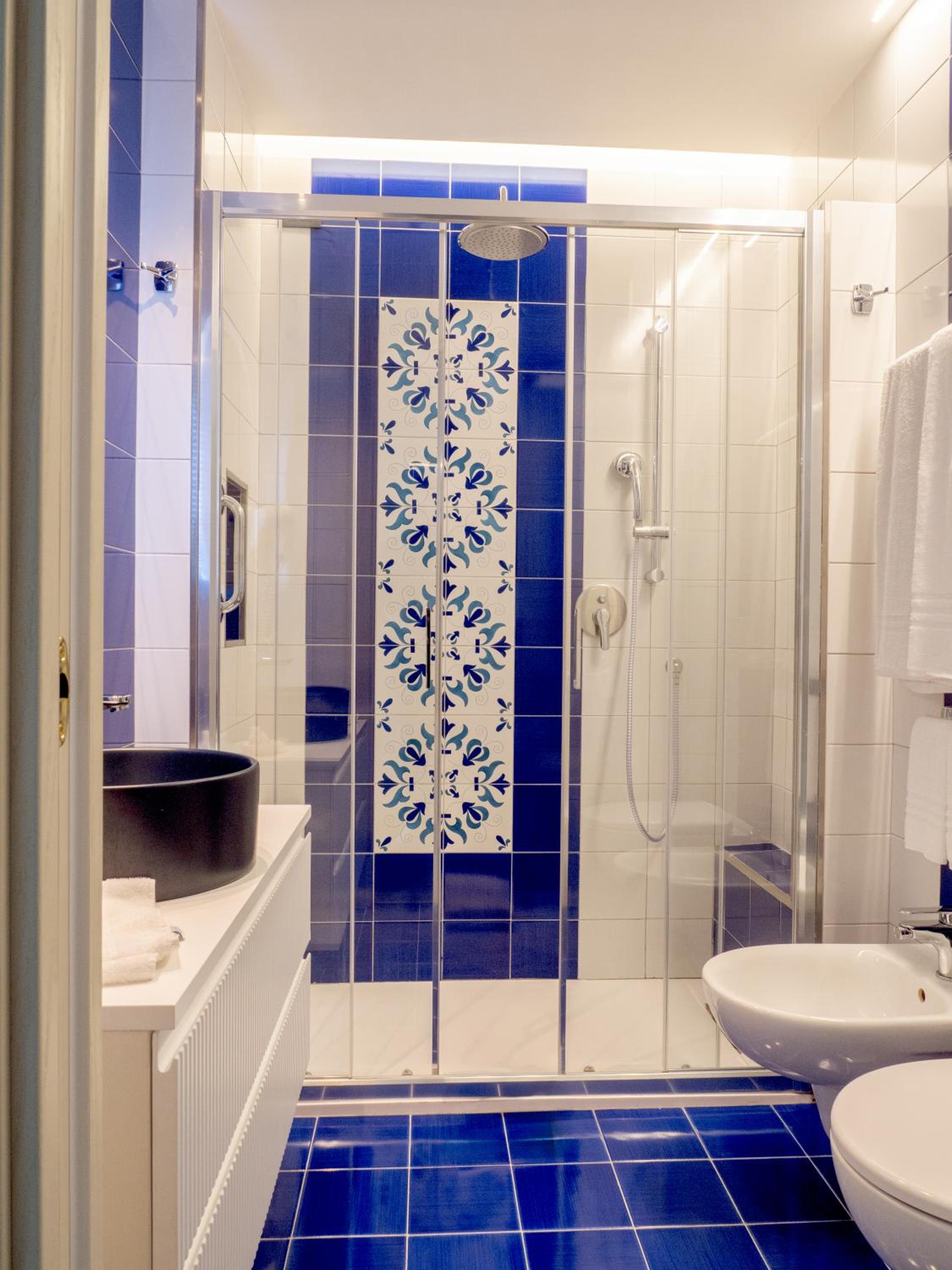 Classic Quadruple Room - Photo 24