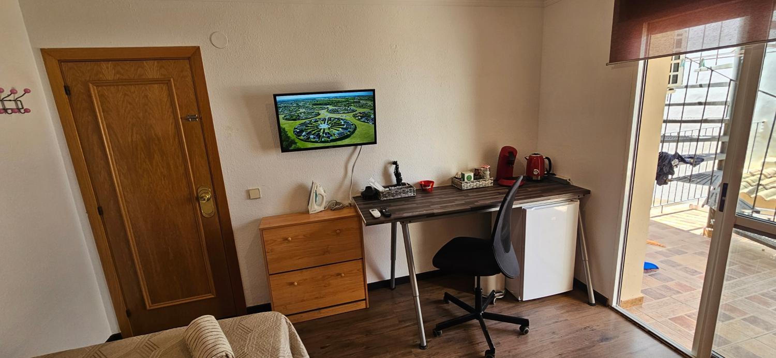 Habitación Queen con Baño Compartido