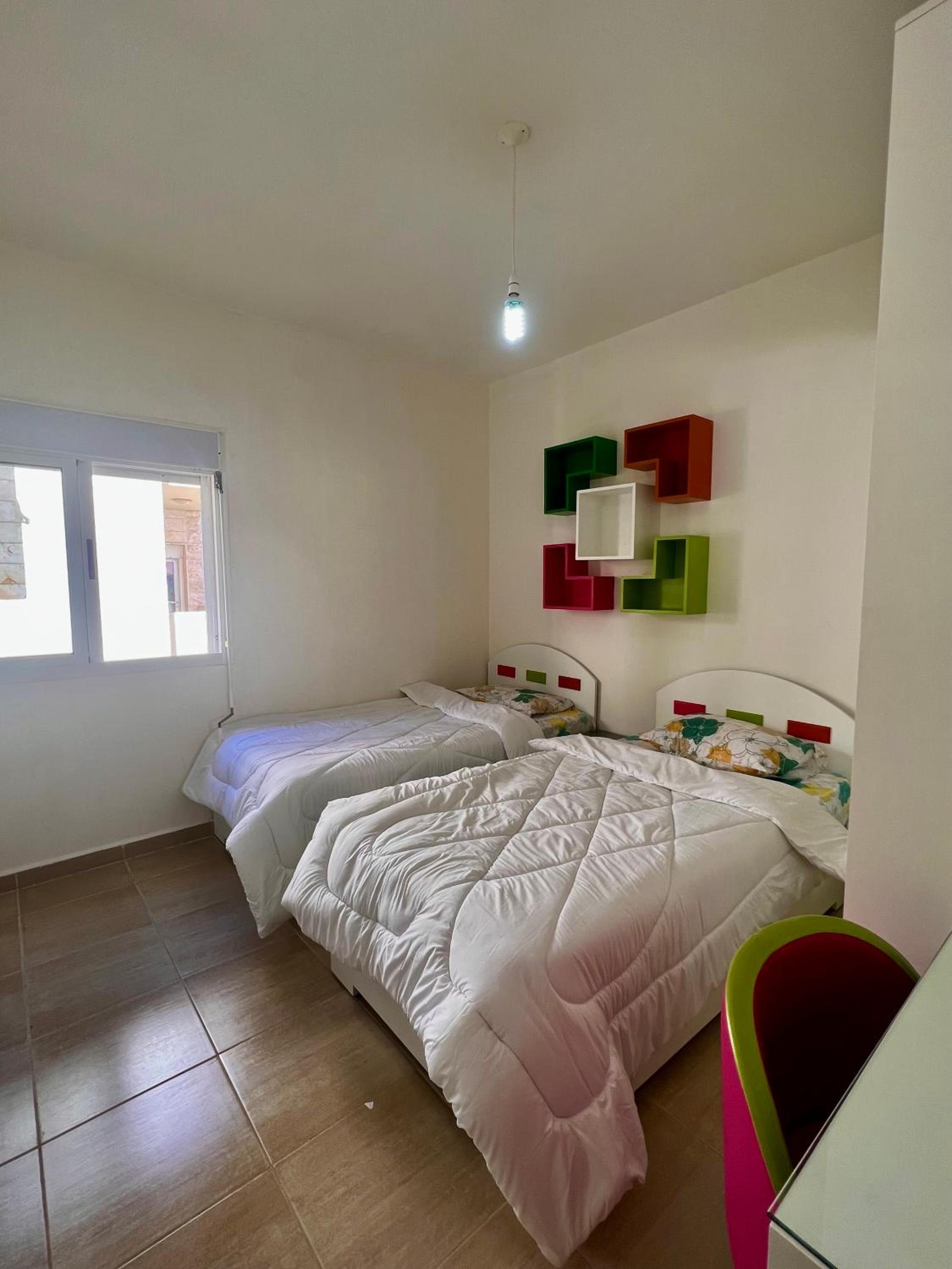Three-Bedroom Apartment with Balcony photo 1