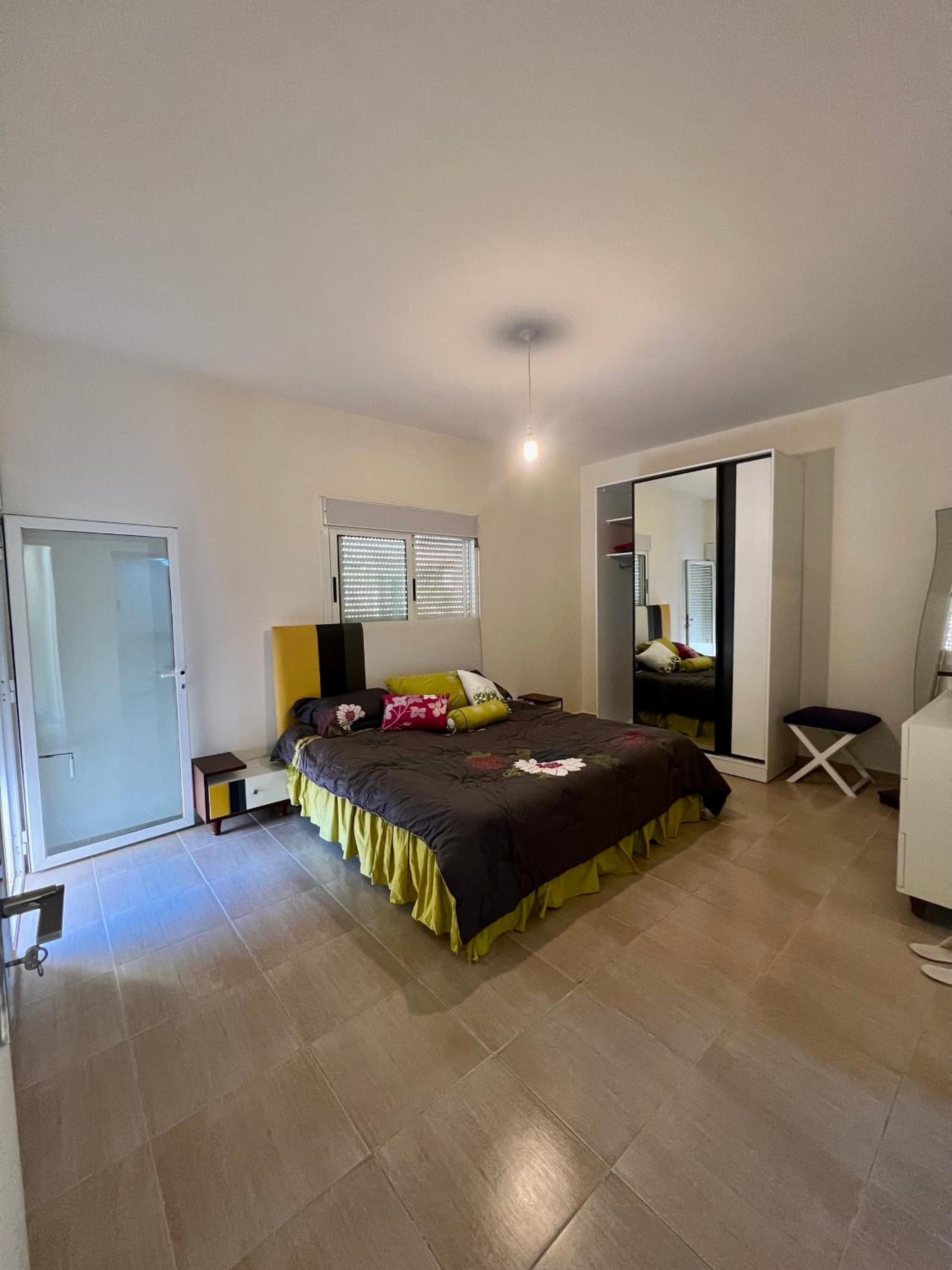 Three-Bedroom Apartment with Balcony photo 3