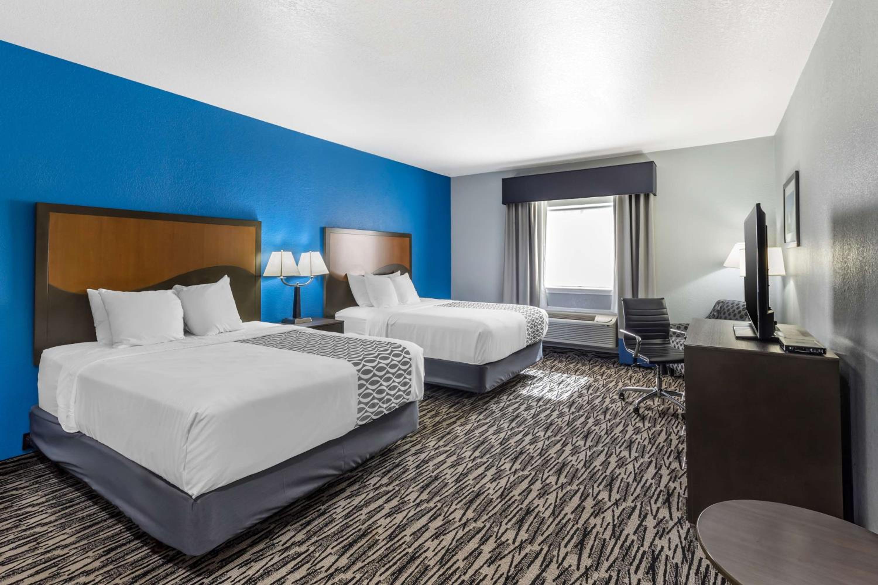 Queen Room with Two Queen Beds - Photo 1