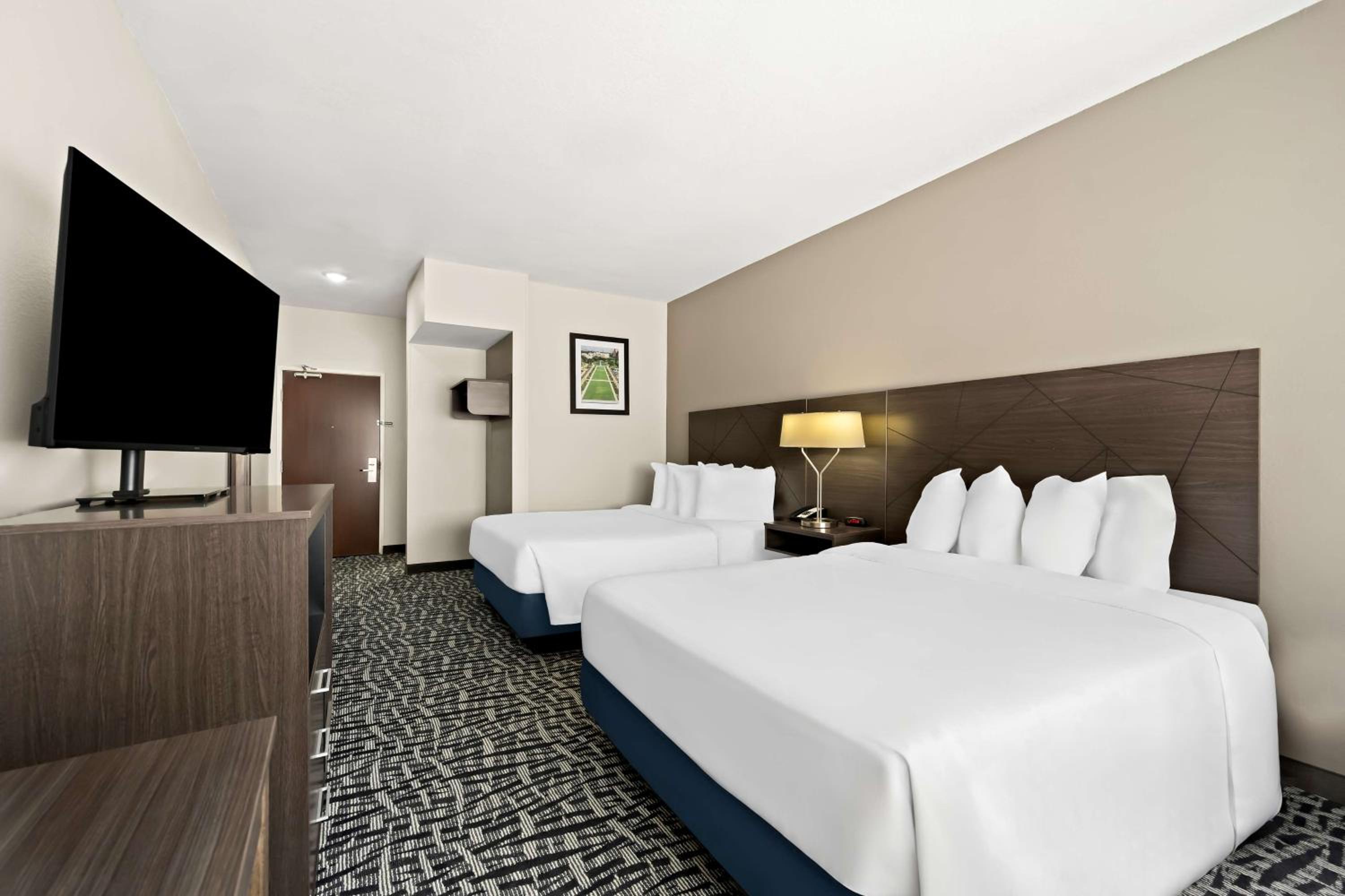 Queen Room with Two Queen Beds and Mobility Accessible Bathtub - Photo 1