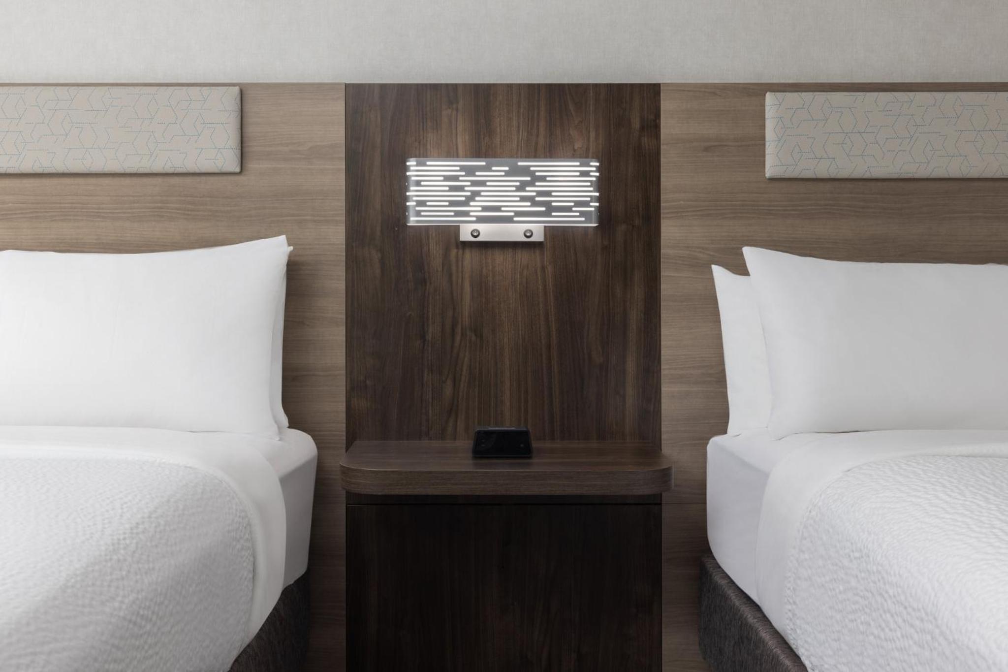 Queen Suite with Two Queen Beds and Additional Living Area - Photo 2