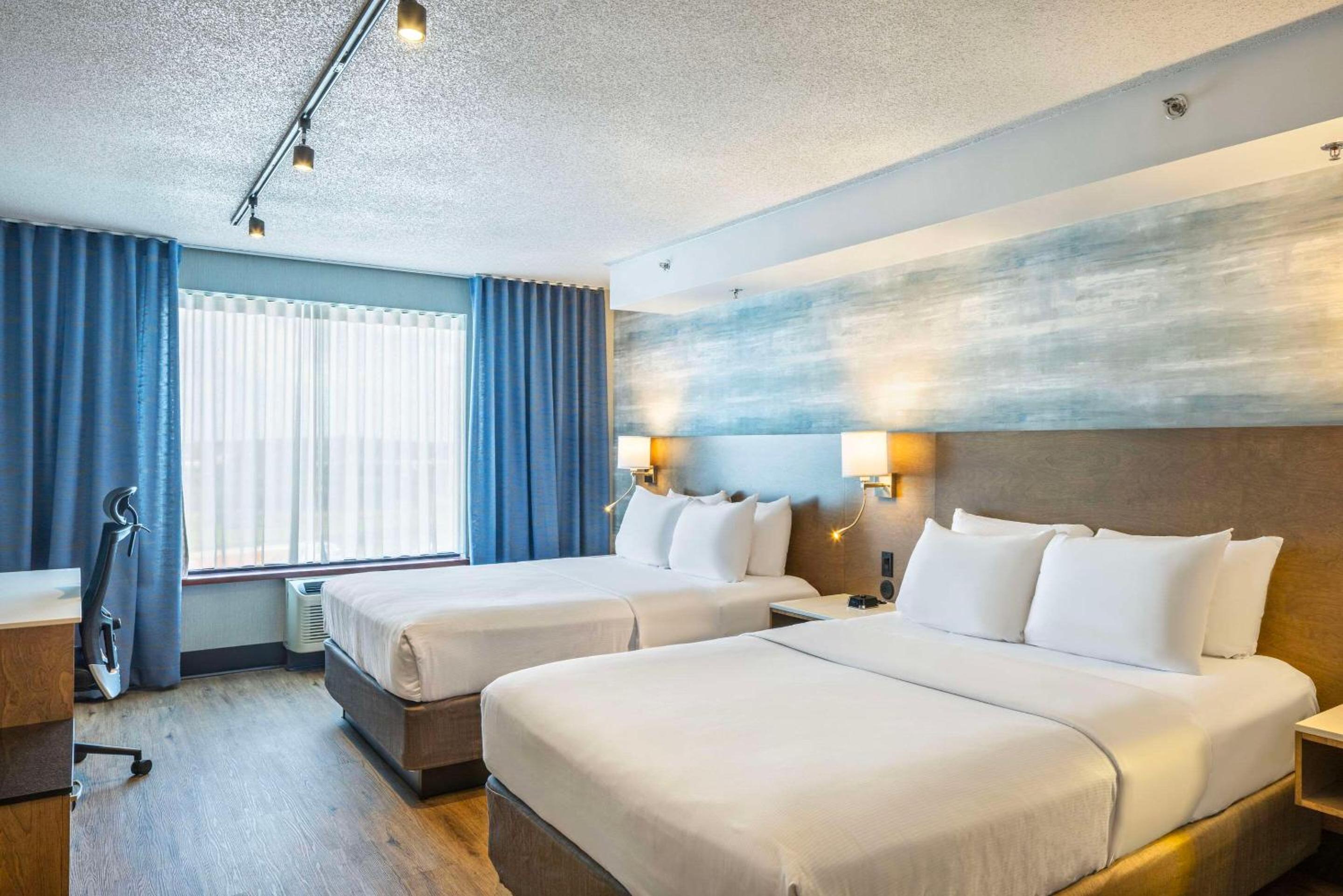 Queen Room with Two Queen Beds - Photo 1