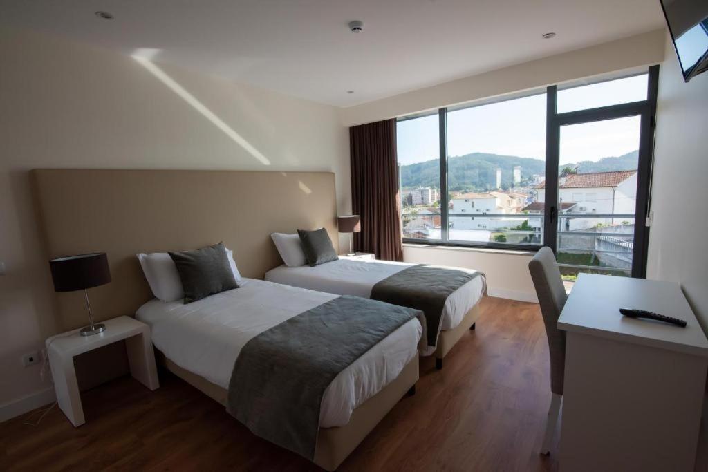 Quarto Duplo com Varanda