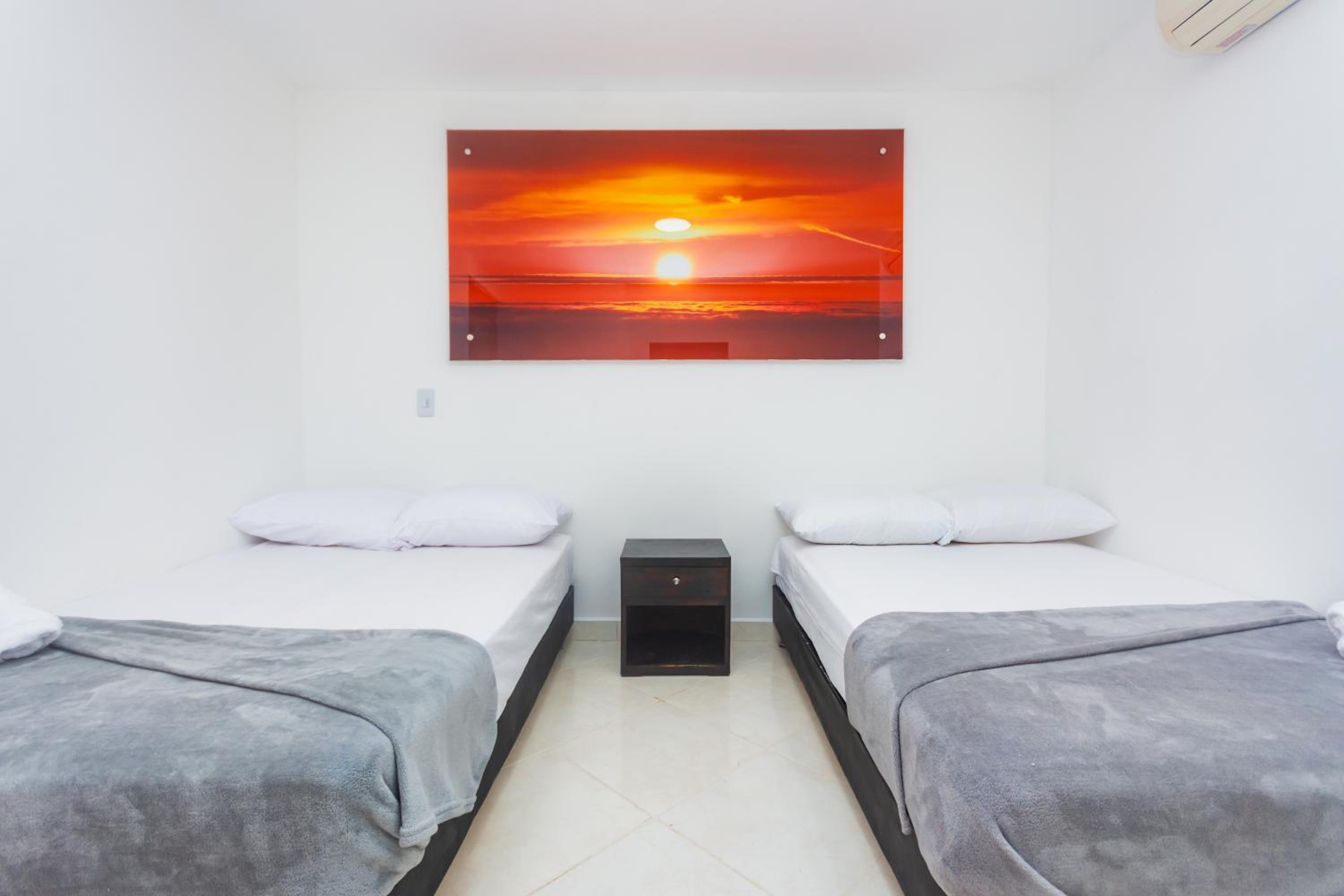 Standard Queen Room with Two Queen Beds photo 1