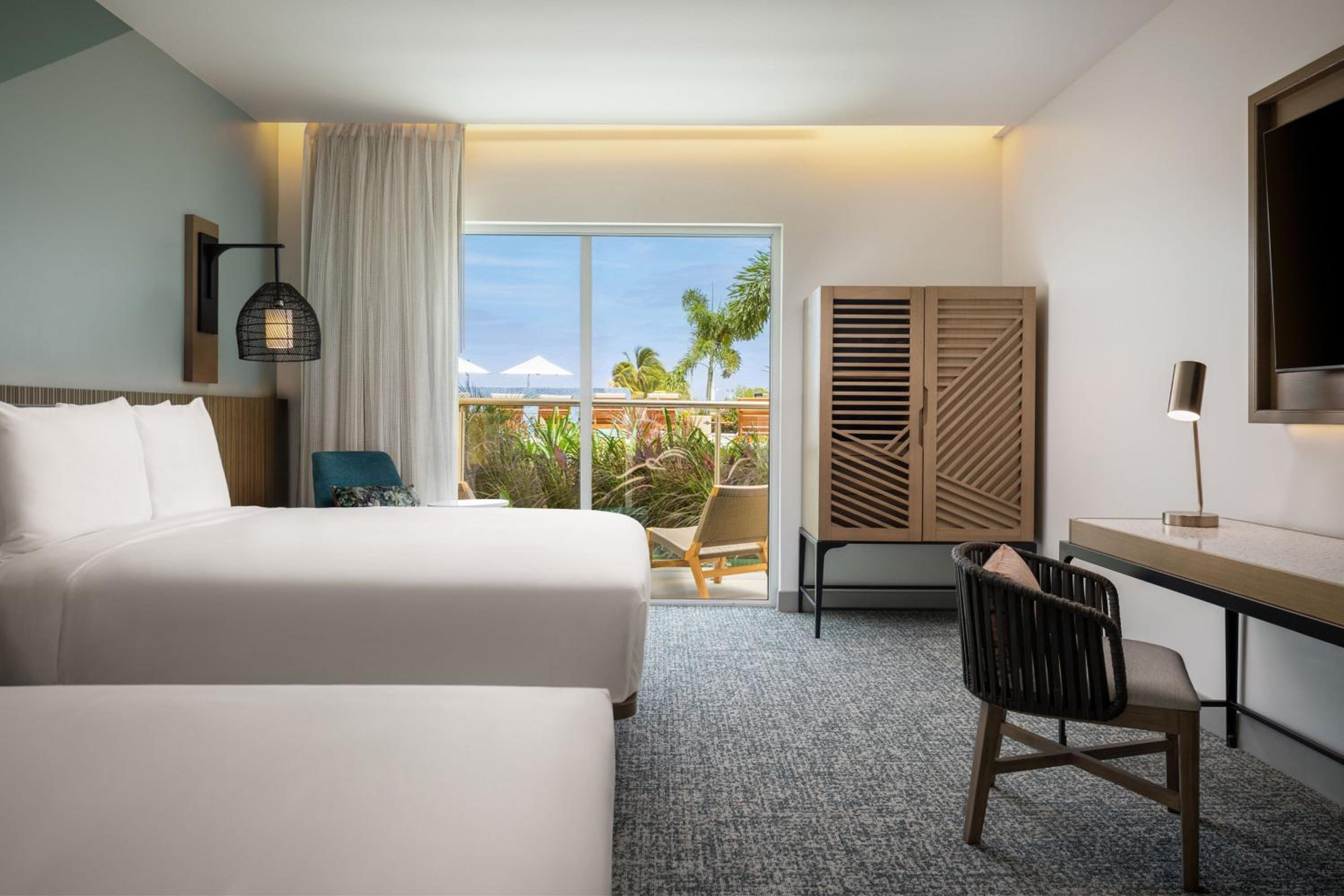 Superior Queen Room with Two Queen Beds, Balcony and Pool View - Photo 1