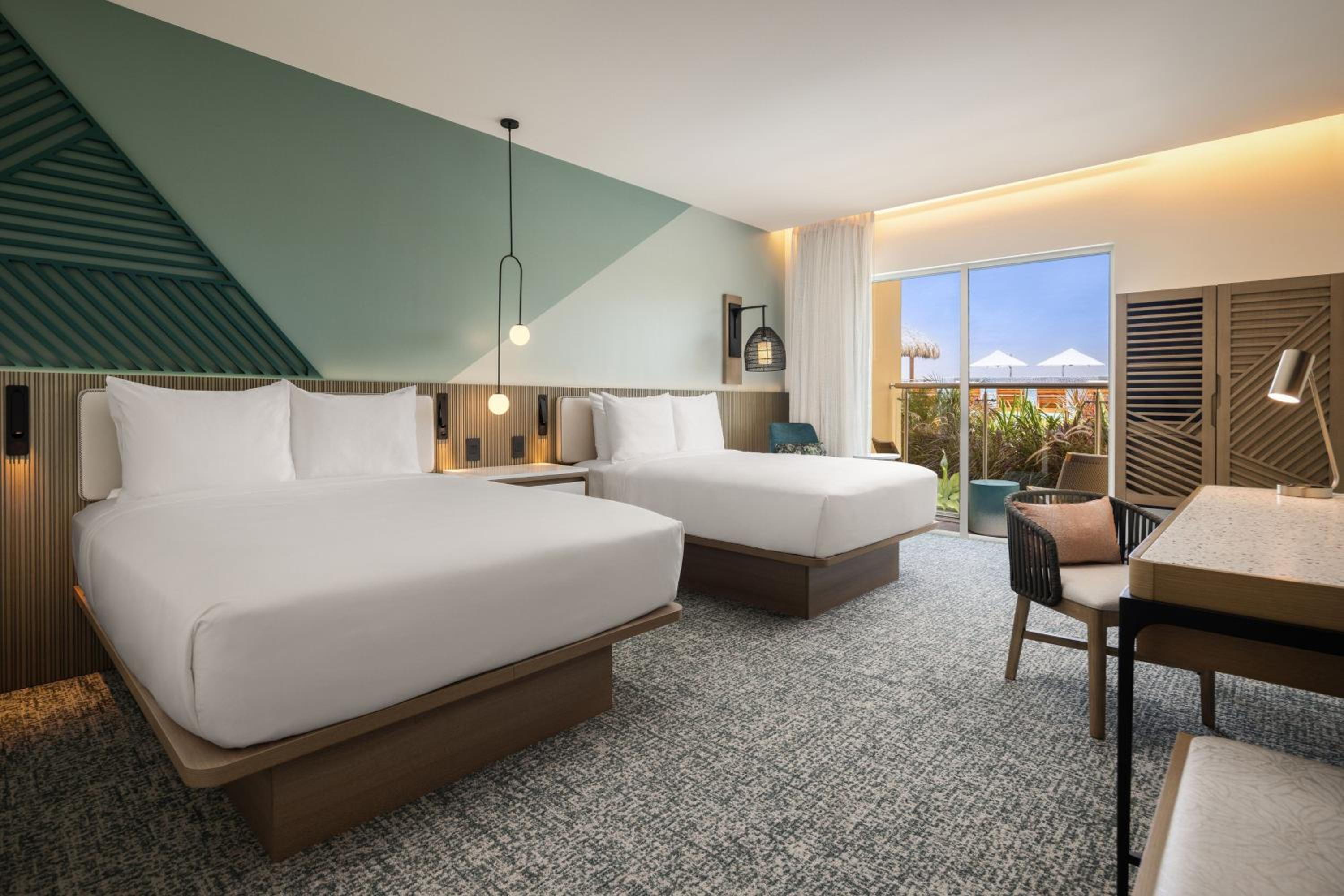 Superior Queen Room with Two Queen Beds, Balcony and Pool View - Photo 3