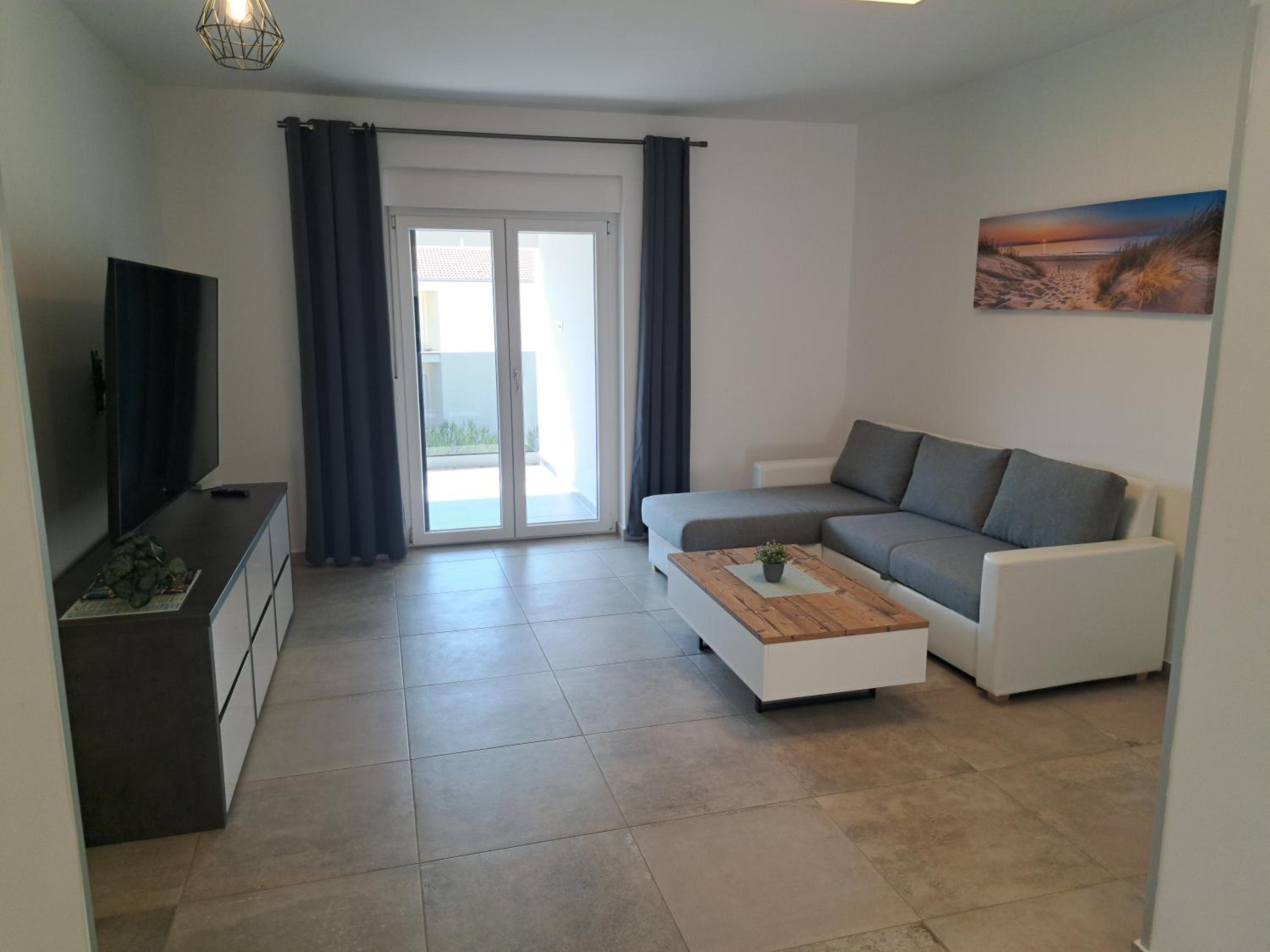 Two-Bedroom Apartment with Balcony and Sea View