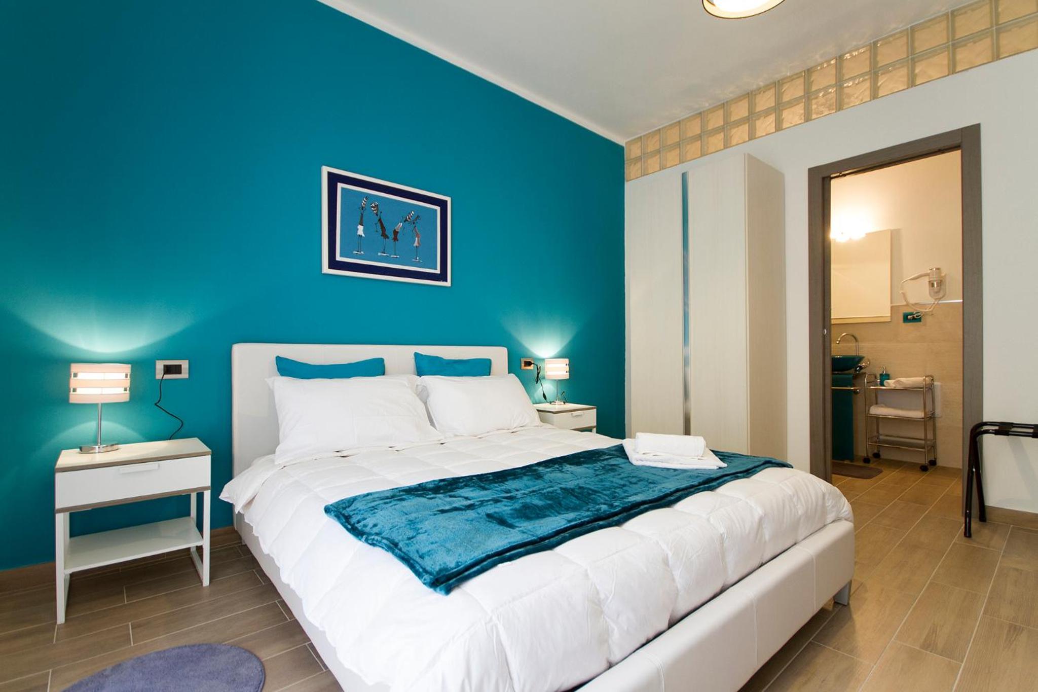 Quadruple Room with Private Bathroom