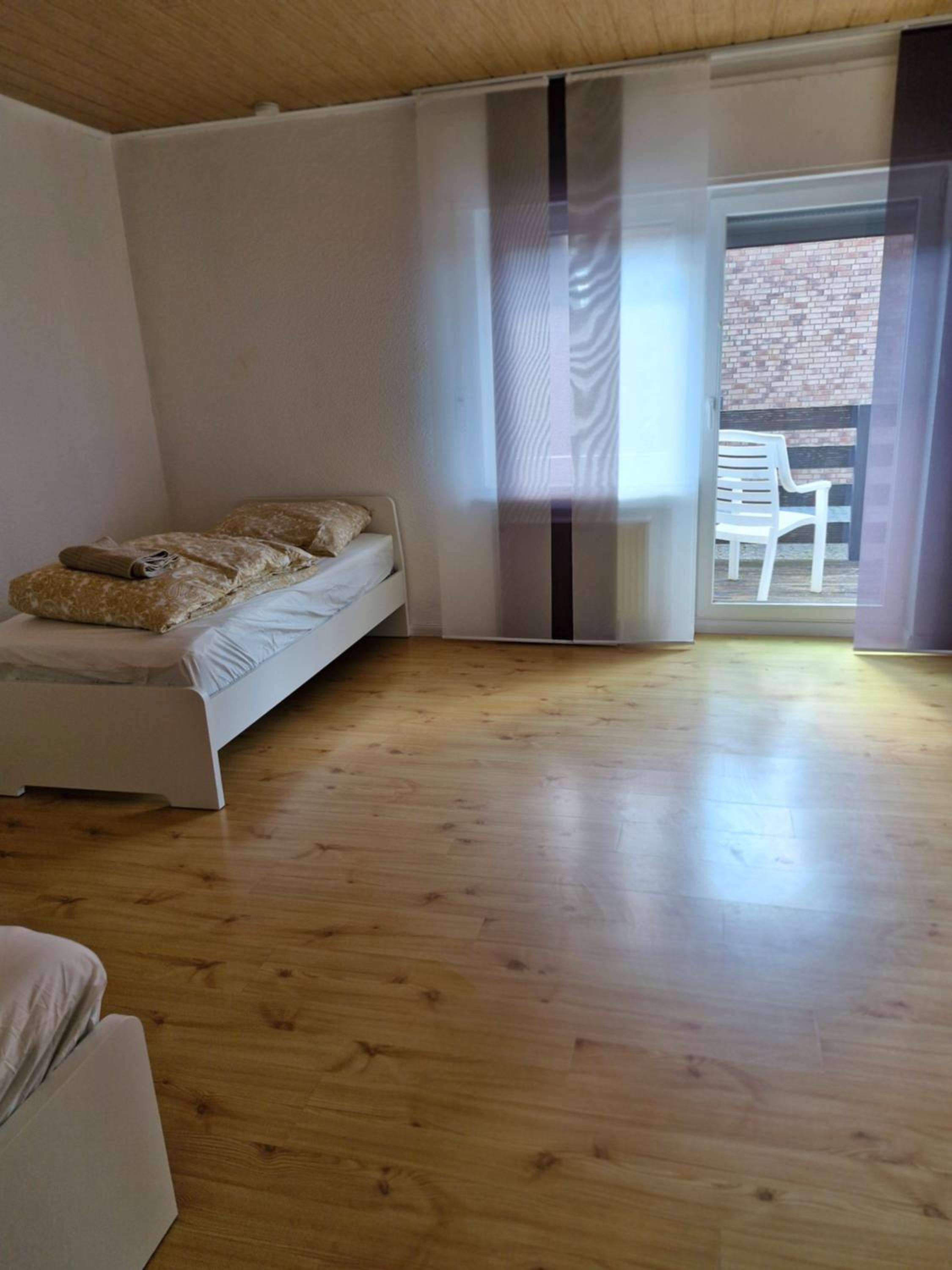 Four-Bedroom Apartment with Balcony  photo 1