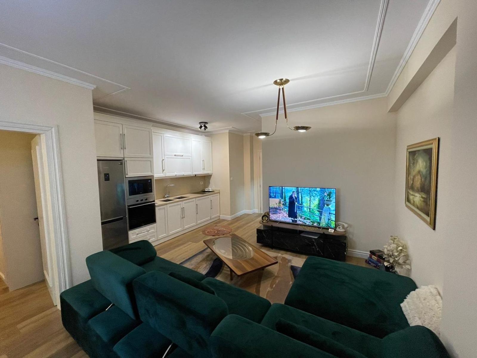 One-Bedroom Apartment with Balcony and City View