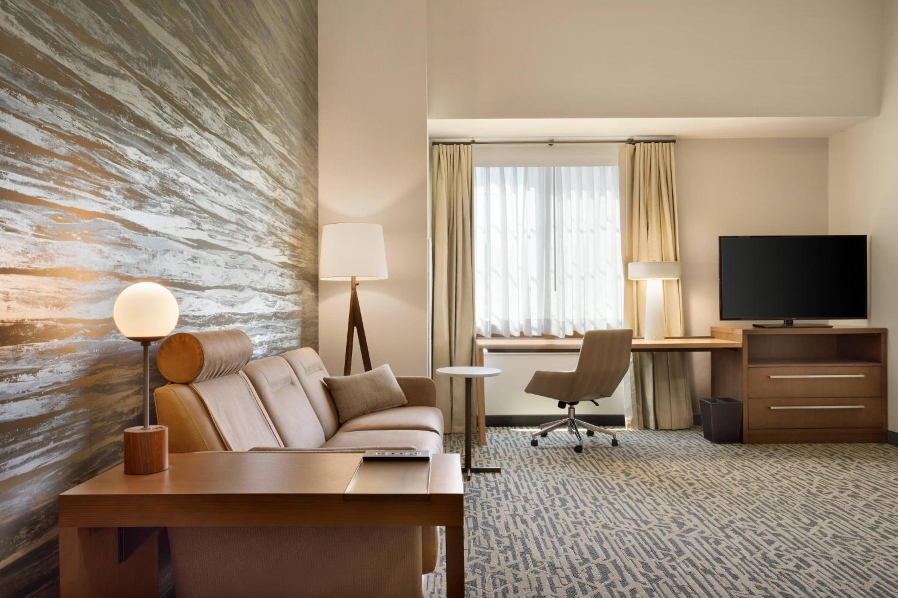 One-Bedroom King Suite with Sofa Bed photo 1