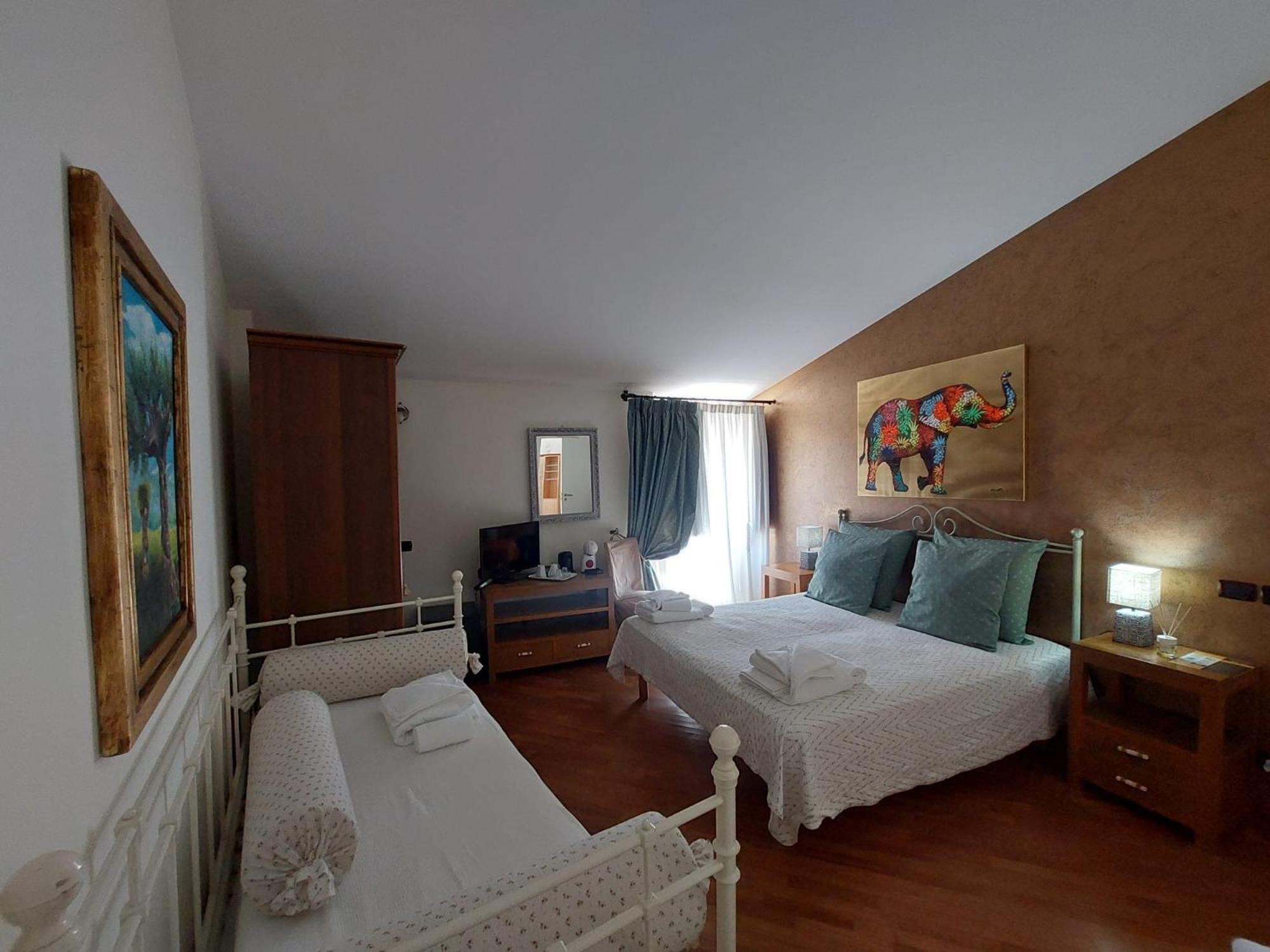 Standard Quadruple Room - Photo 7