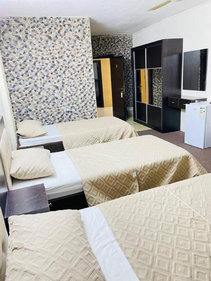 Deluxe Triple Room - Photo 7