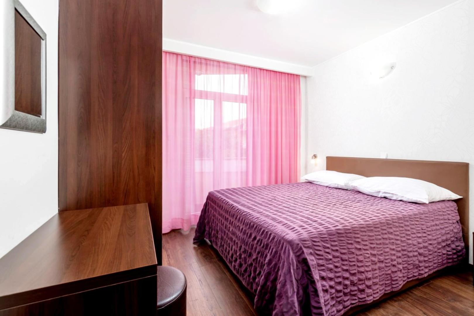 Two-Bedroom Apartment with Balcony and Sea View