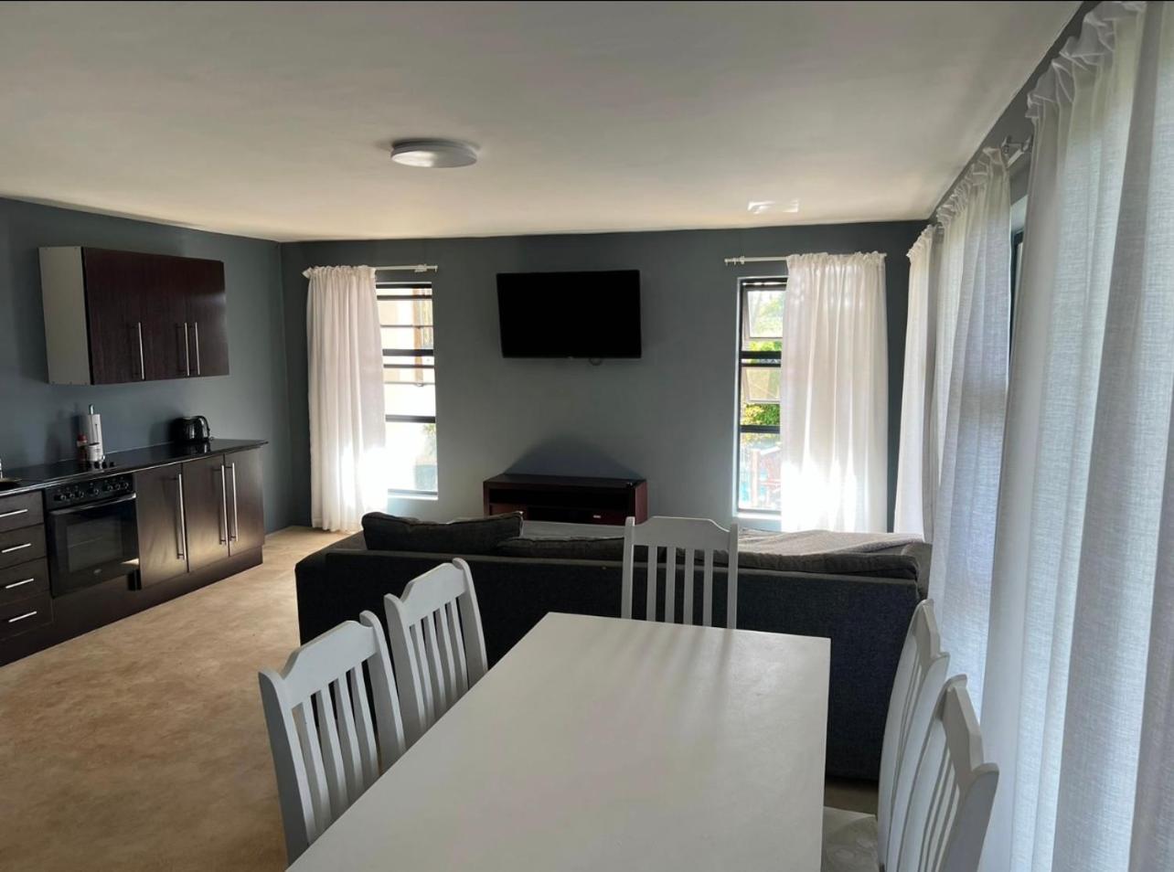 Three-Bedroom Apartment photo 1