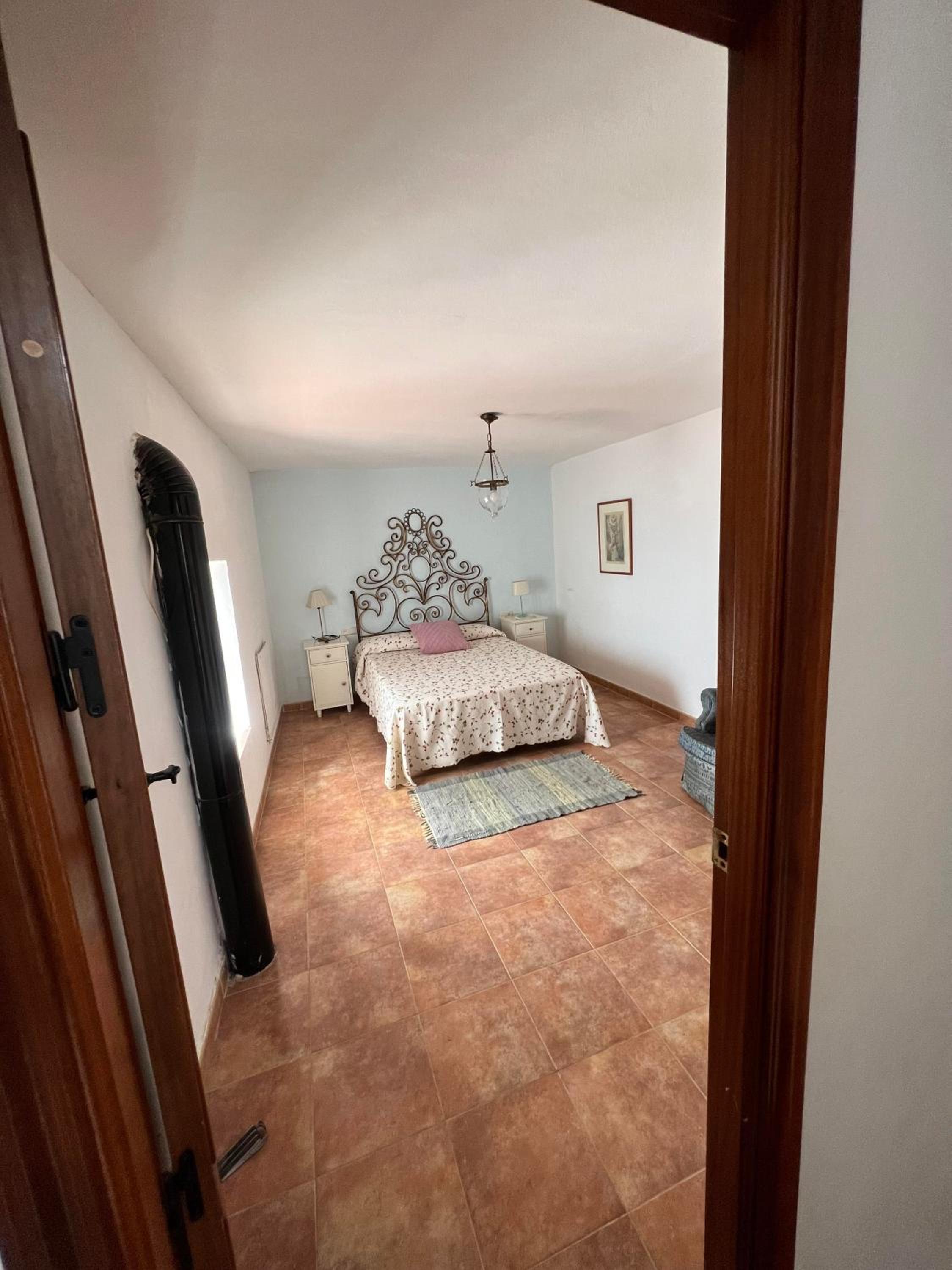 Casa de cuatro habitaciones