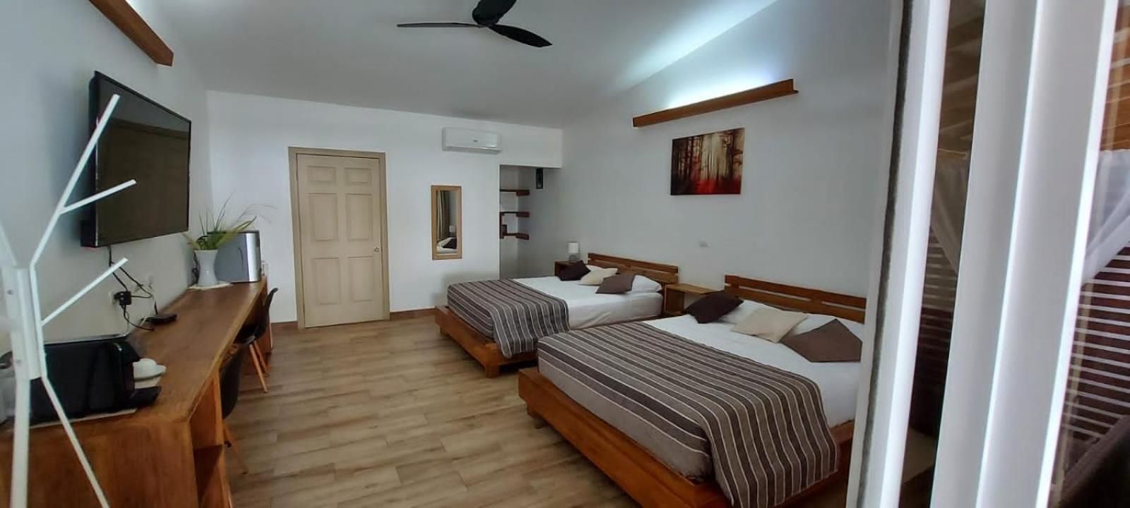 Deluxe Queen Room with Two Queen Beds photo 1