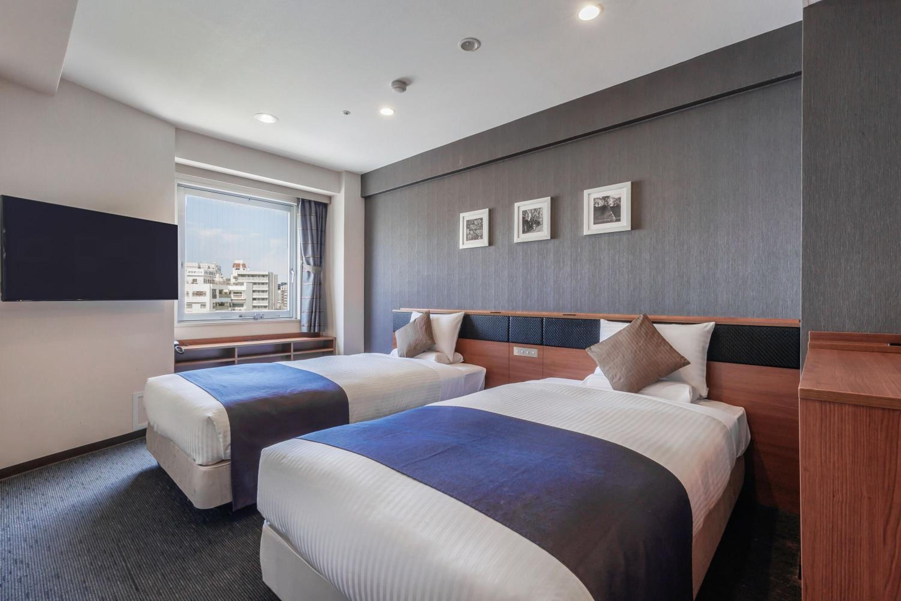 Twin Room - Non-Smoking - Photo 1