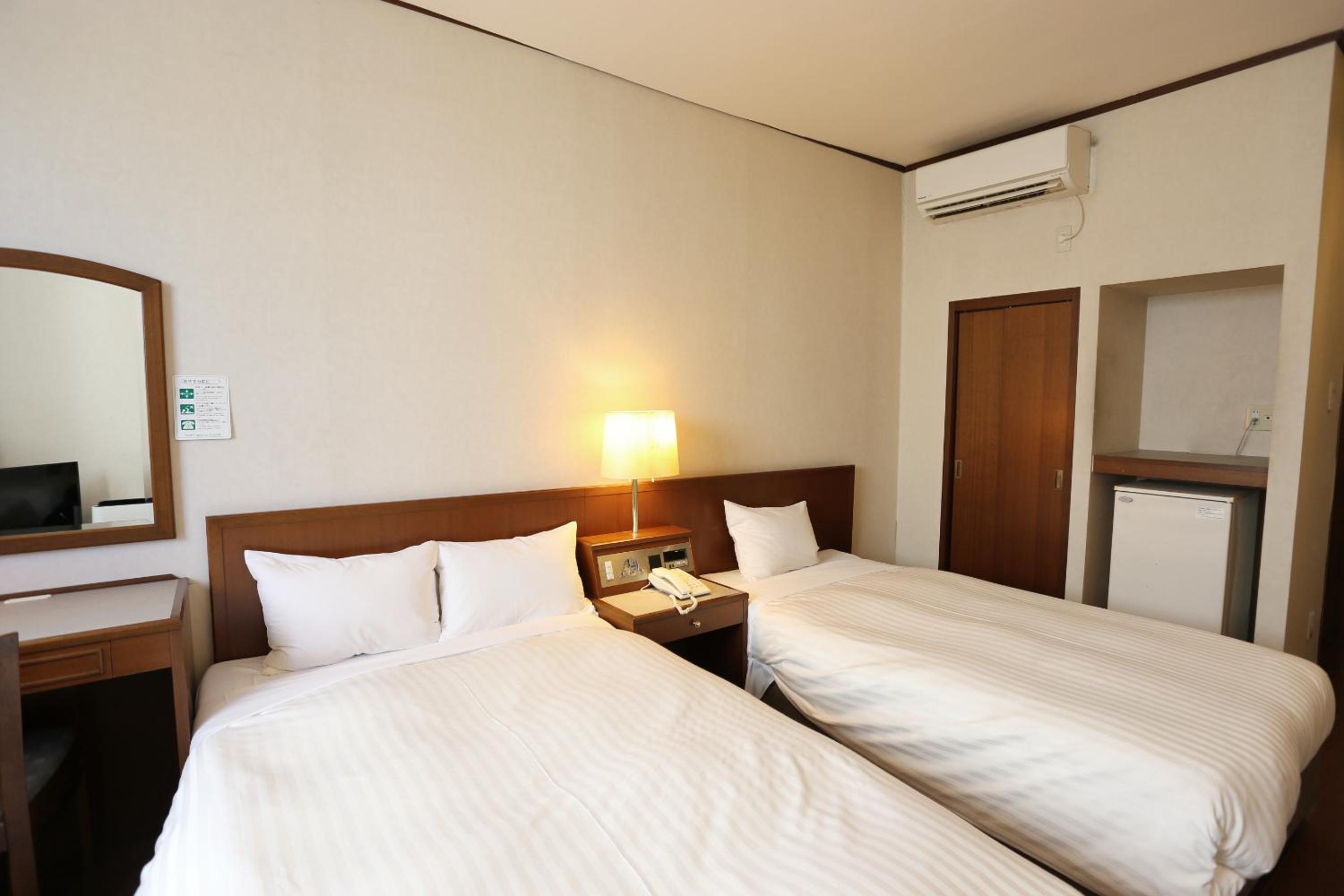 Twin Room - Photo 1