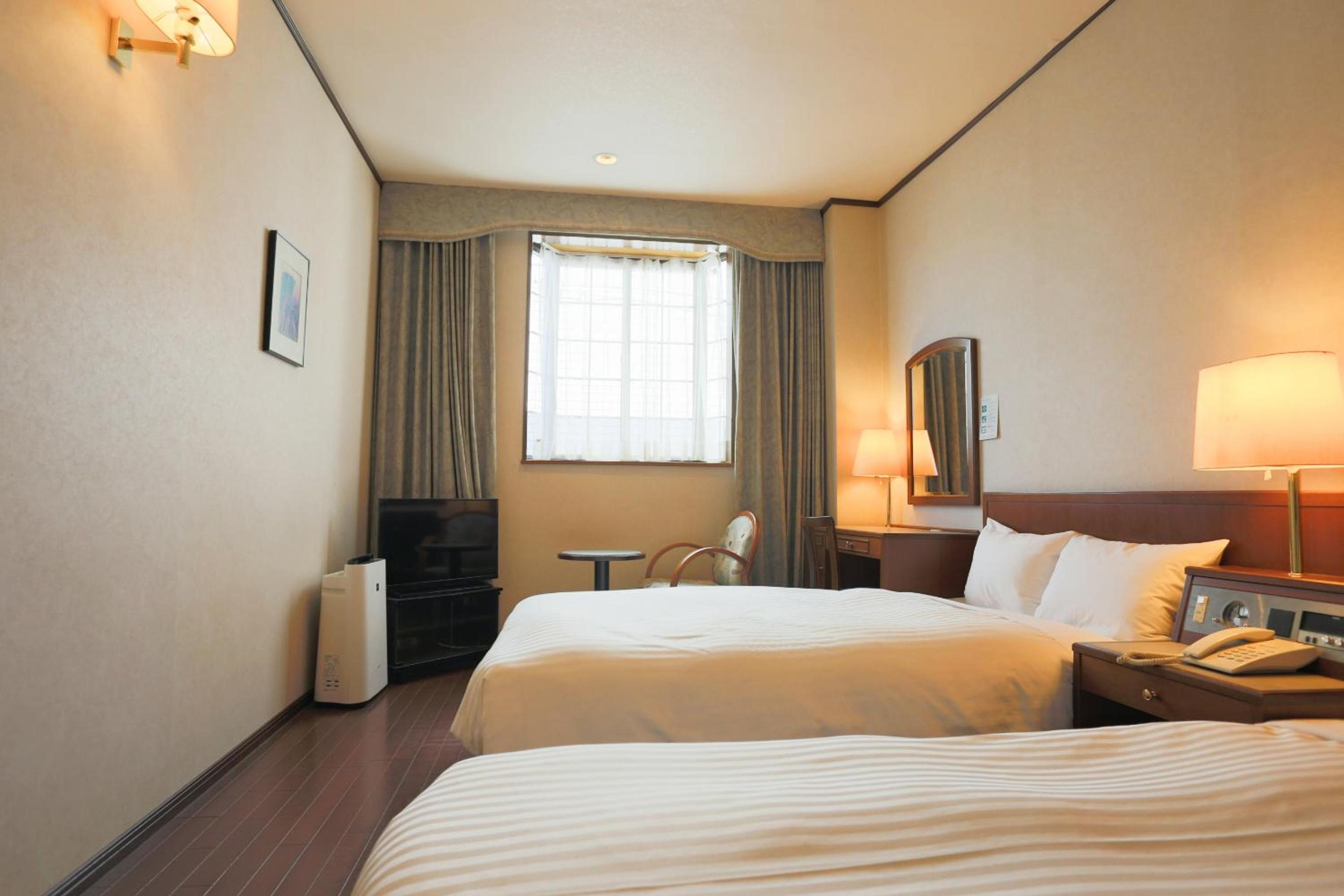 Twin Room - Photo 4