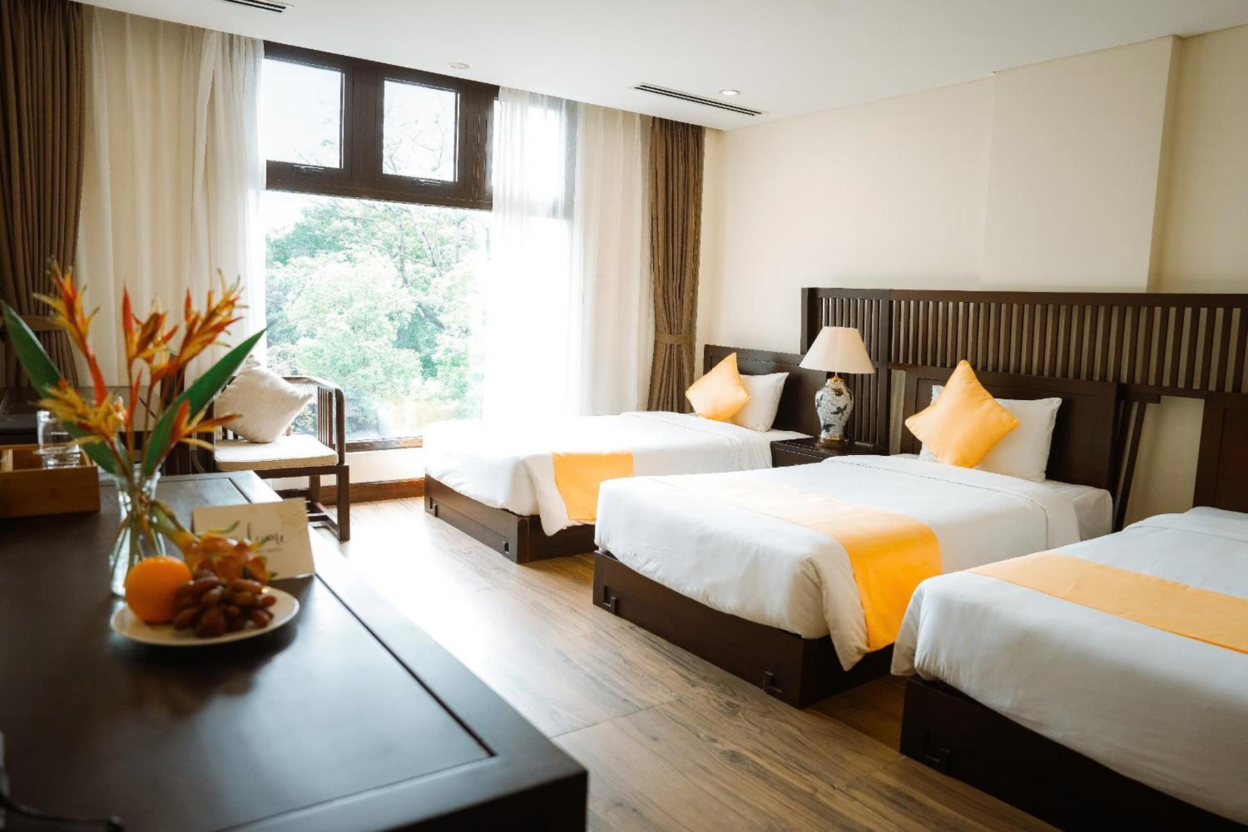 Deluxe Triple Room - Photo 8