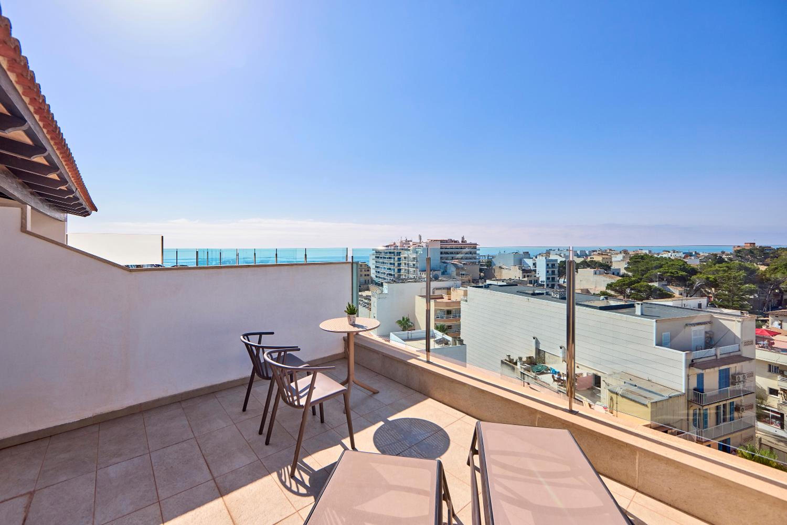 Superior Room with Terrace and Side Sea Views.