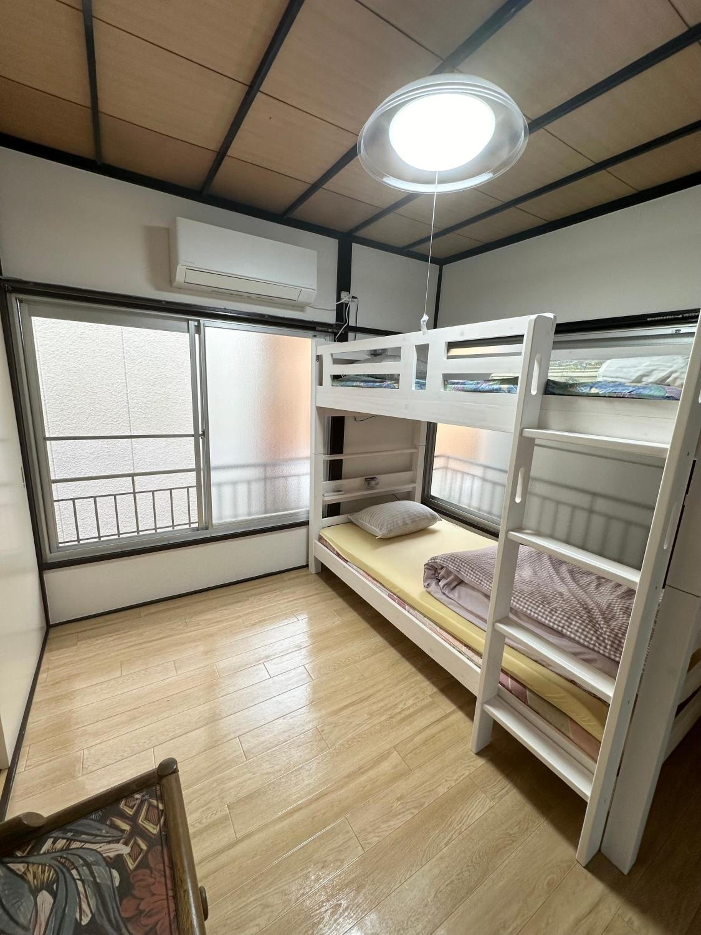 Single Bed In Female Dormitory Room photo 1
