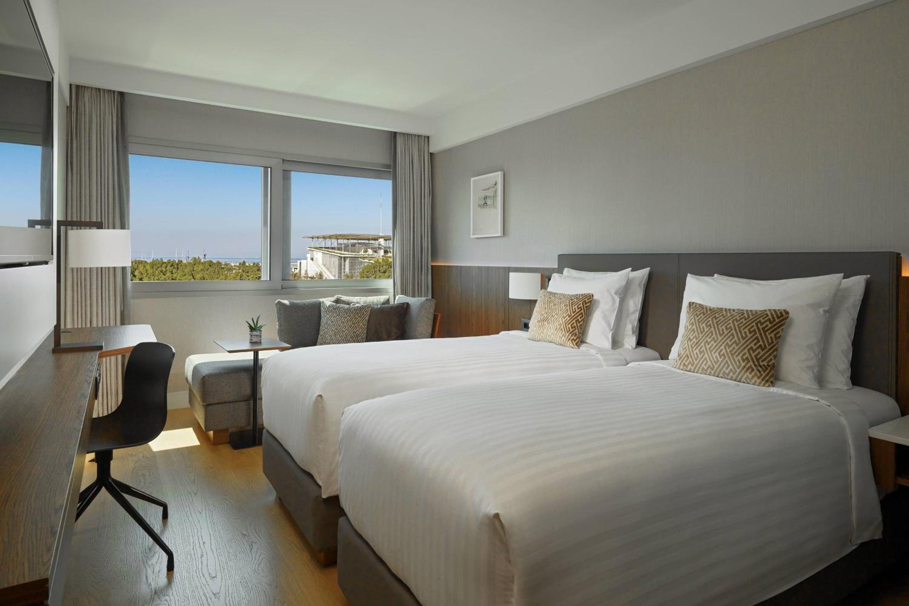 Premium Guest Room with Two Single Beds and City View