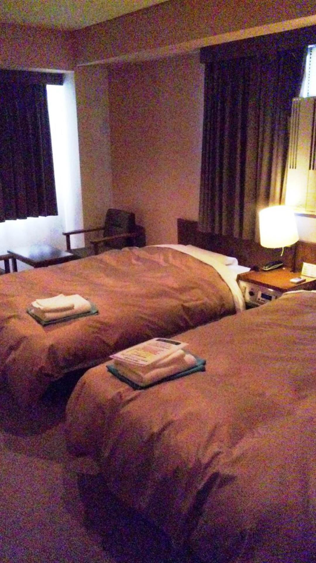 Twin Room with Extra Bed - Smoking photo 3