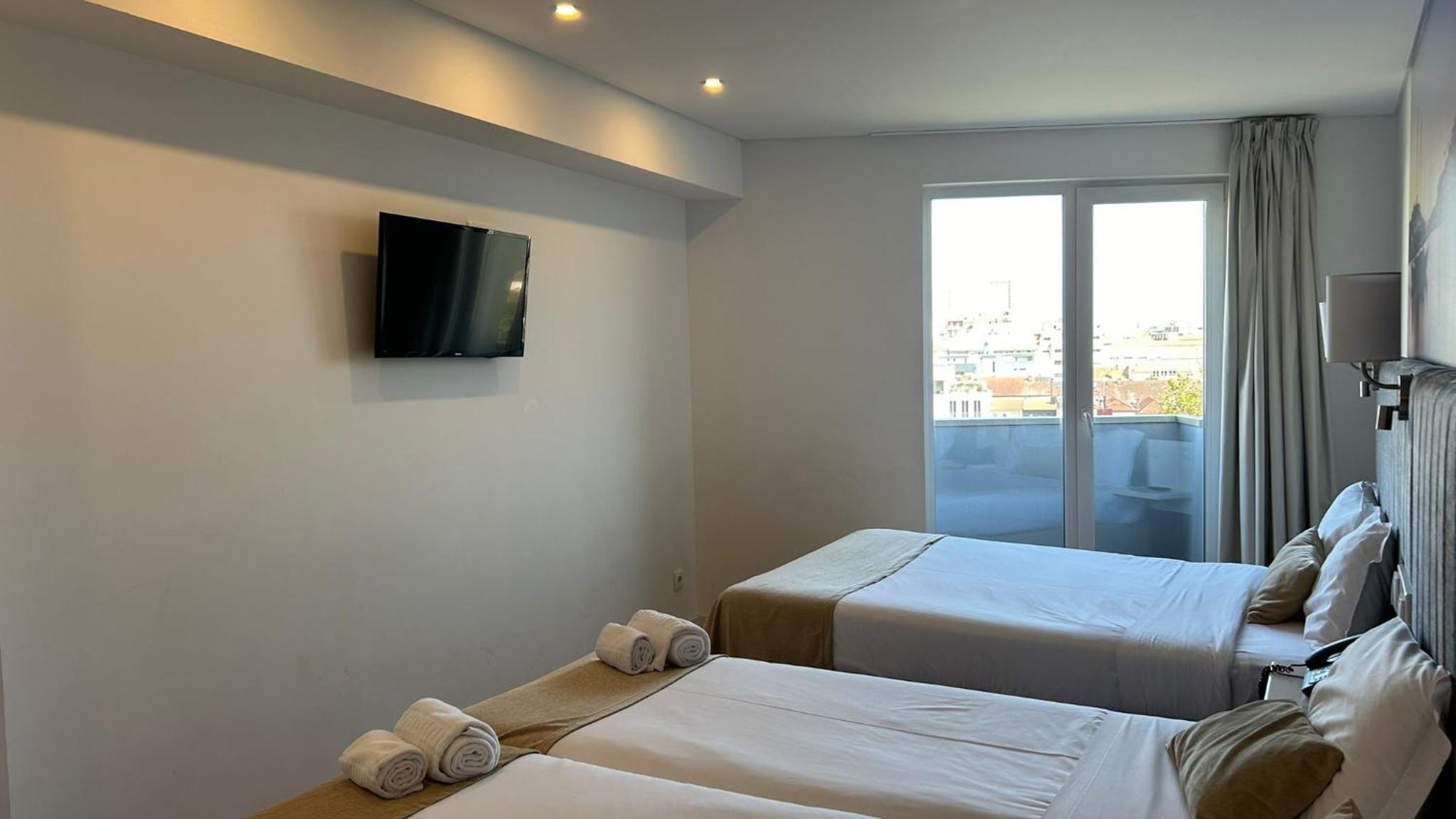 Triple Room with Balcony - Photo 1