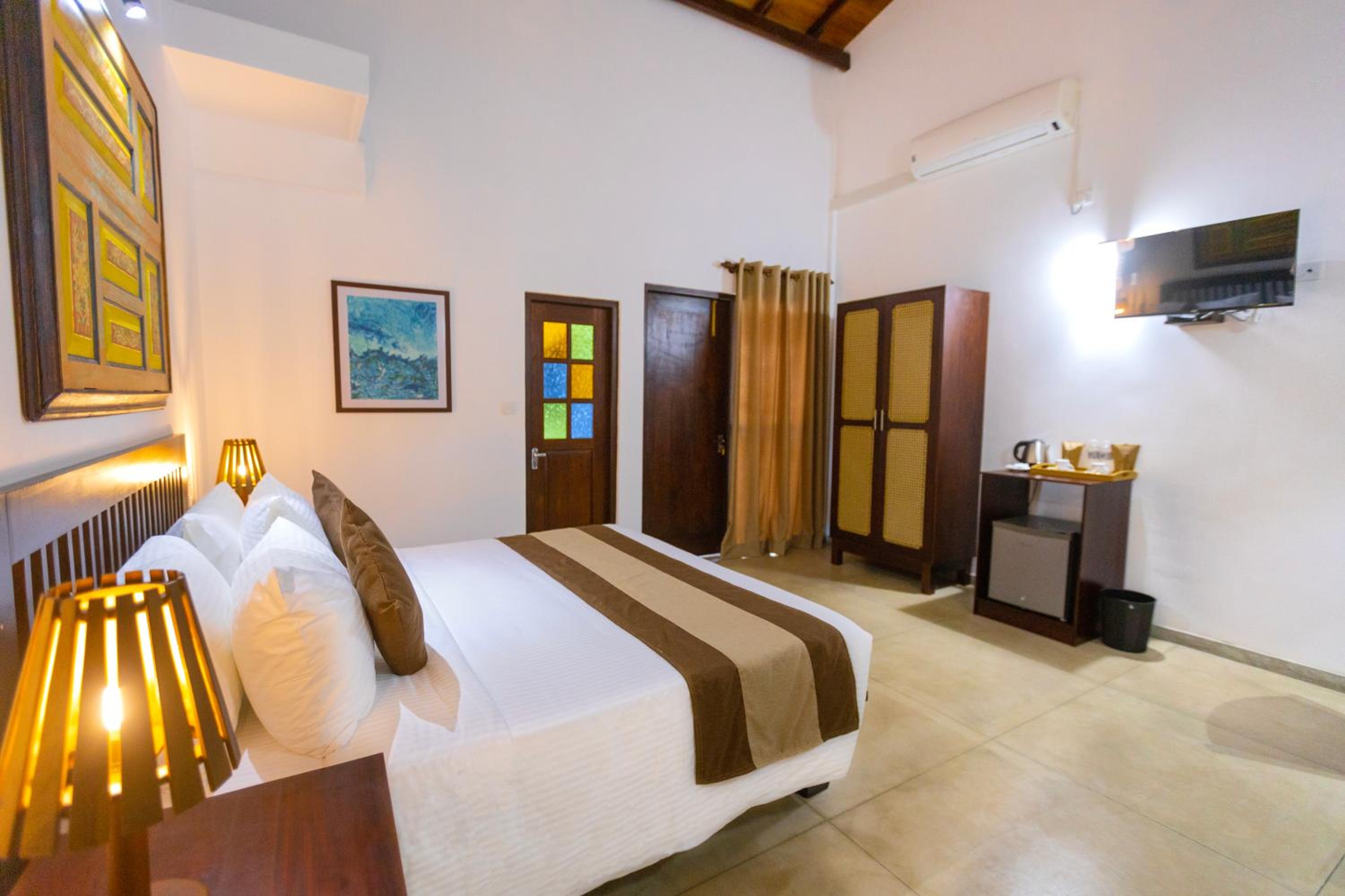 Deluxe Double Room (2 Adults + 1 Child) photo 3