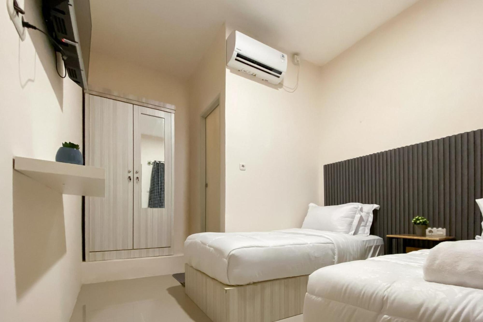 Standard Twin Room - Photo 4