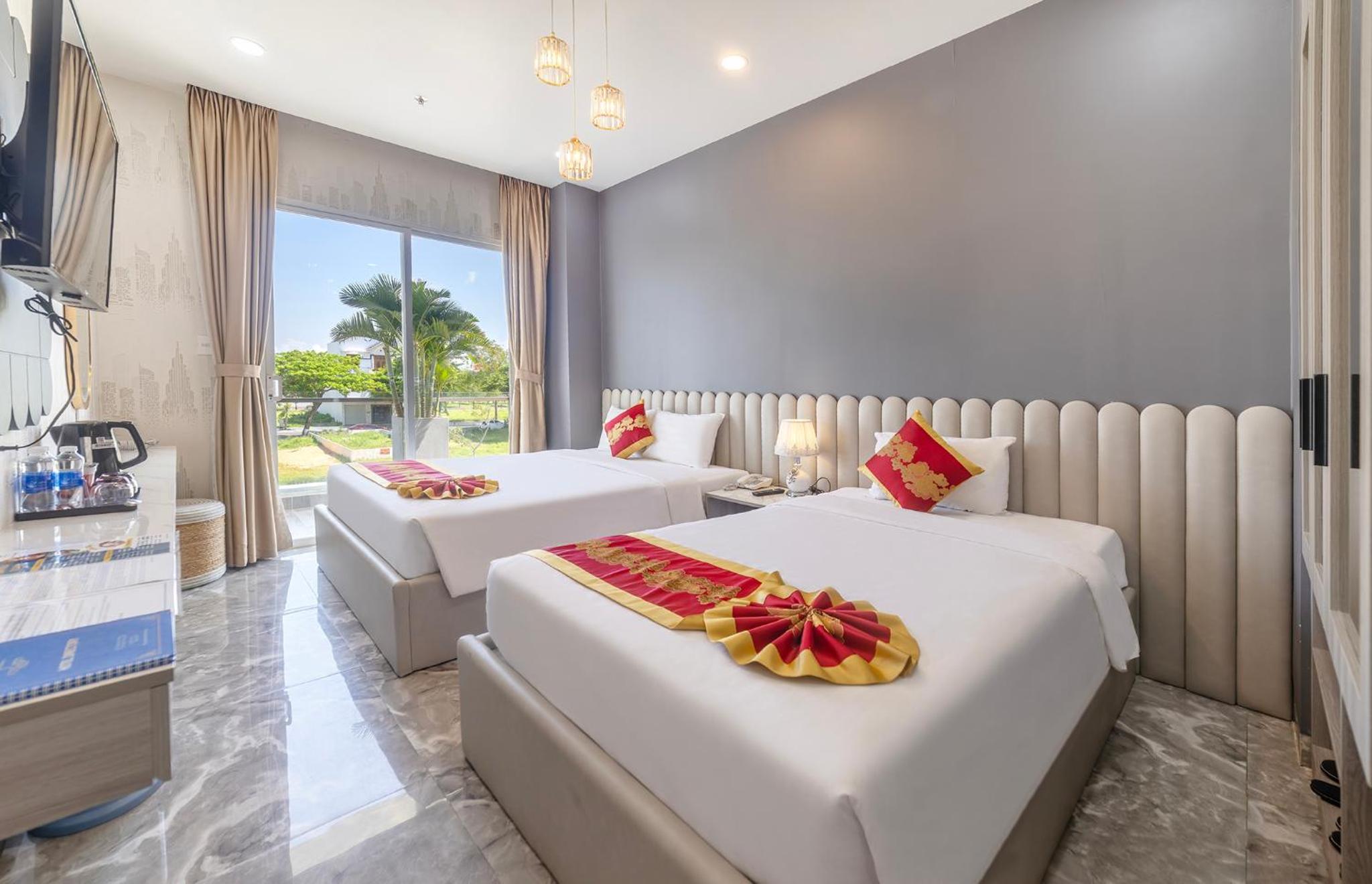 Deluxe Triple Room - Photo 1
