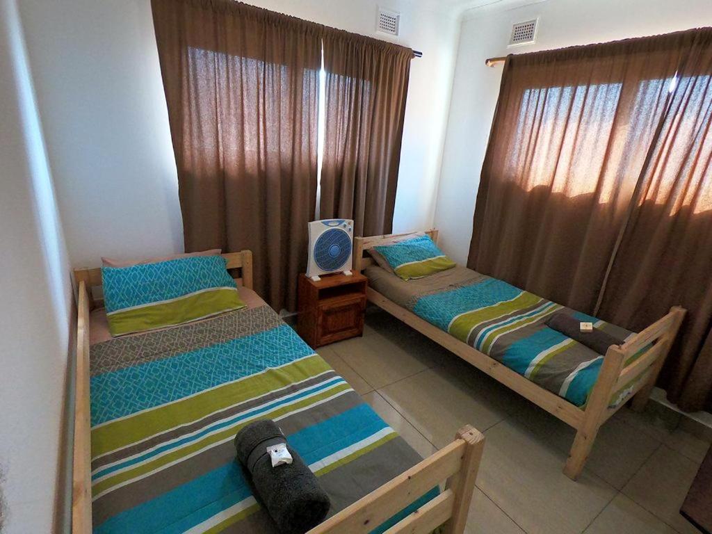 Basic Triple Room with Shared Bathroom photo 1