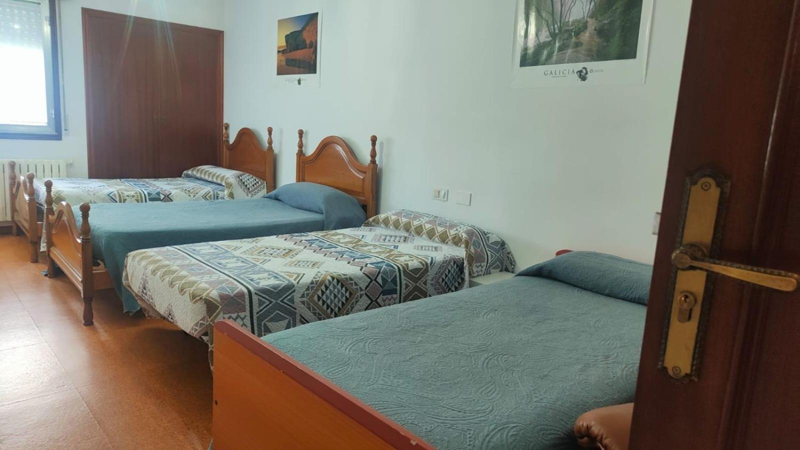 Cama individual en habitación compartida