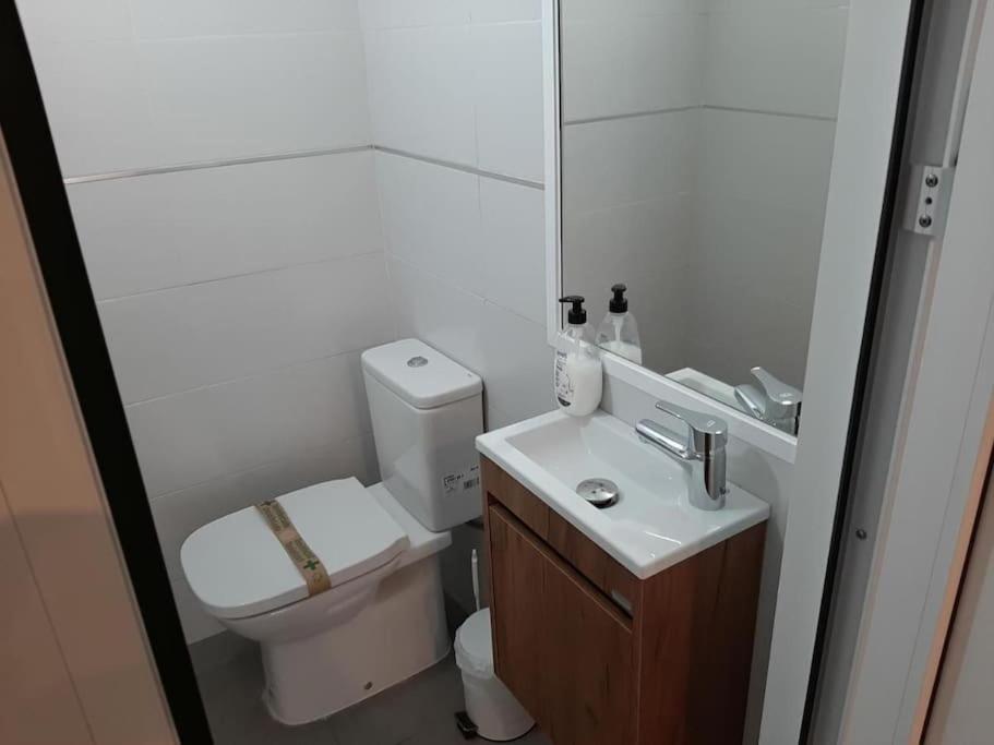 Three-Bedroom House - Photo 28