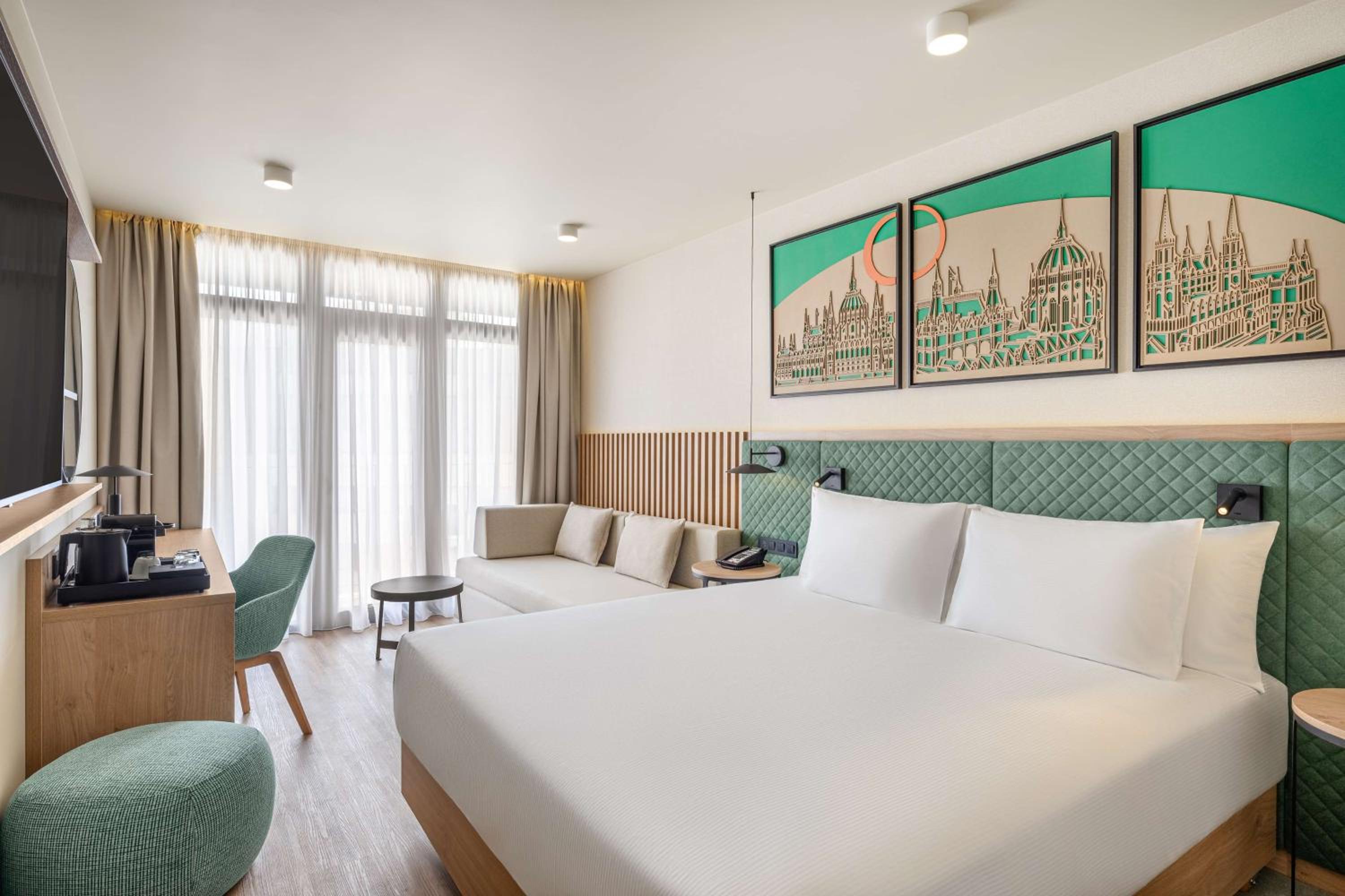 Deluxe King Room with Sofa Bed - Photo 1