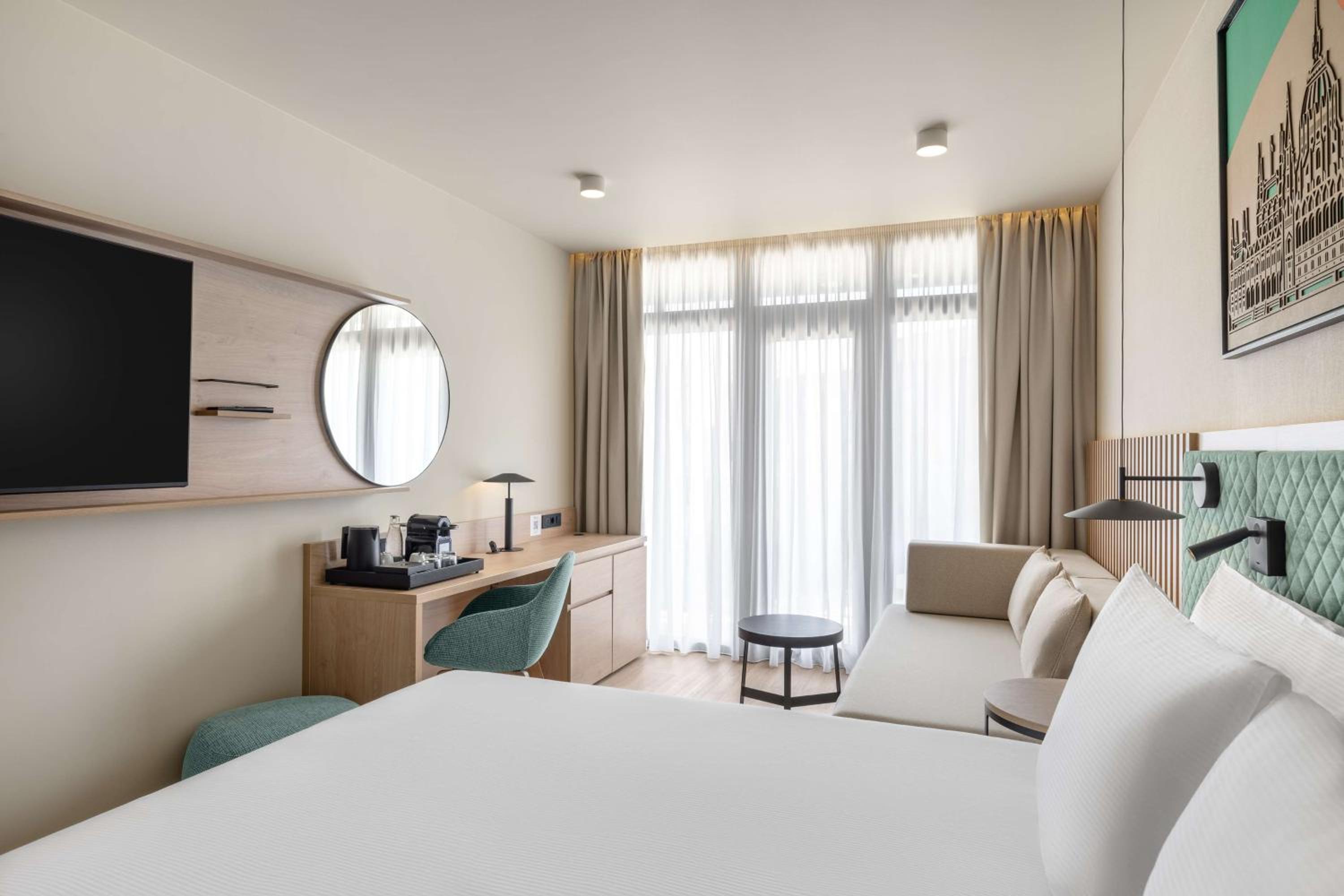Deluxe King Room with Sofa Bed - Photo 2