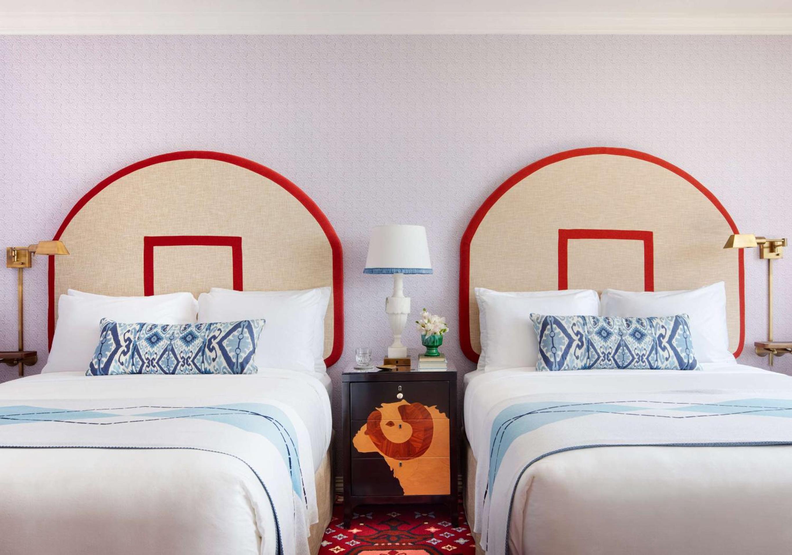 Queen Room with Two Queen Beds and Roll-In Shower - Mobility Access at Graduate by Hilton Chapel Hill in Chapel Hill