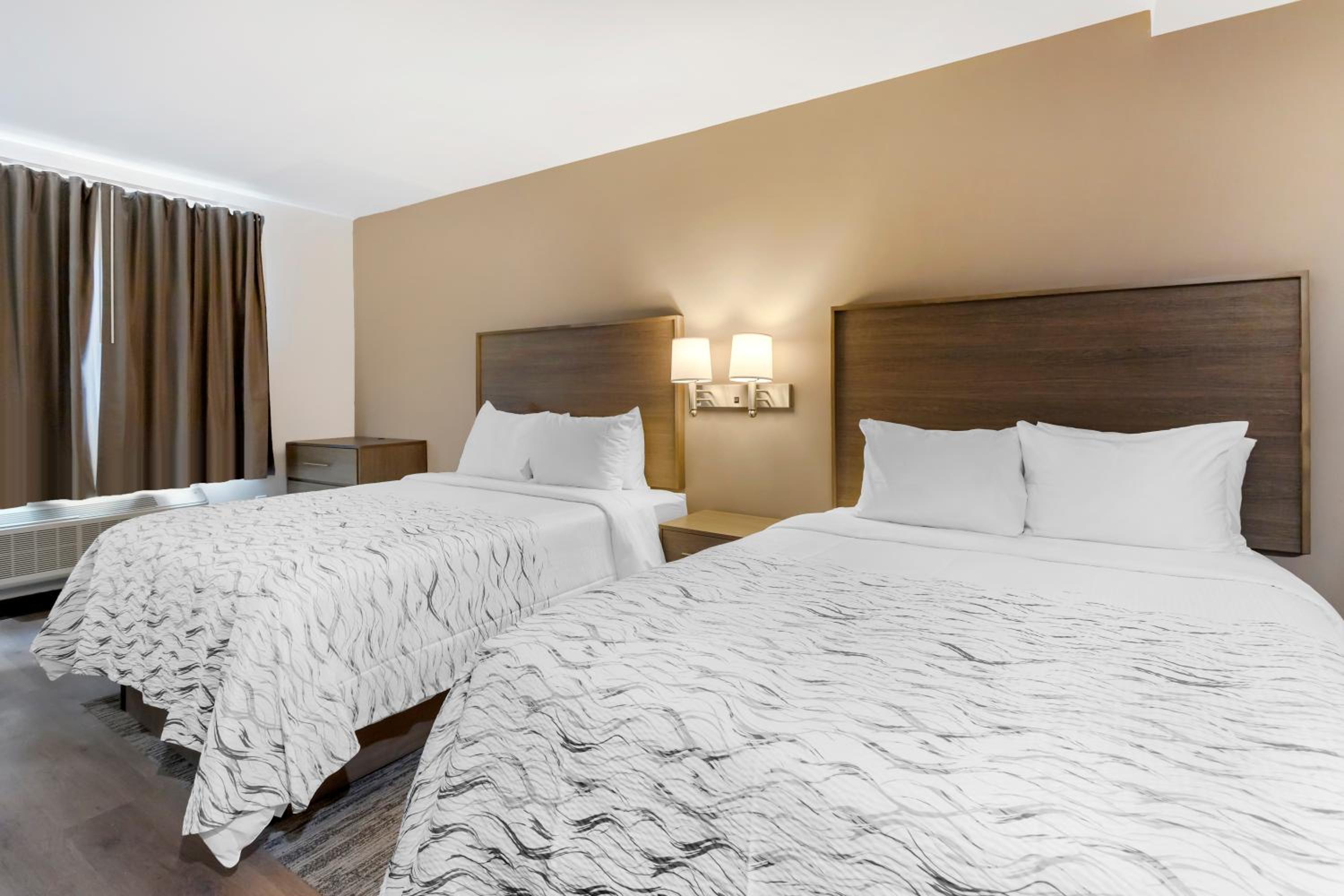 Deluxe Room with Two Queen Beds Smoke Free - Photo 1